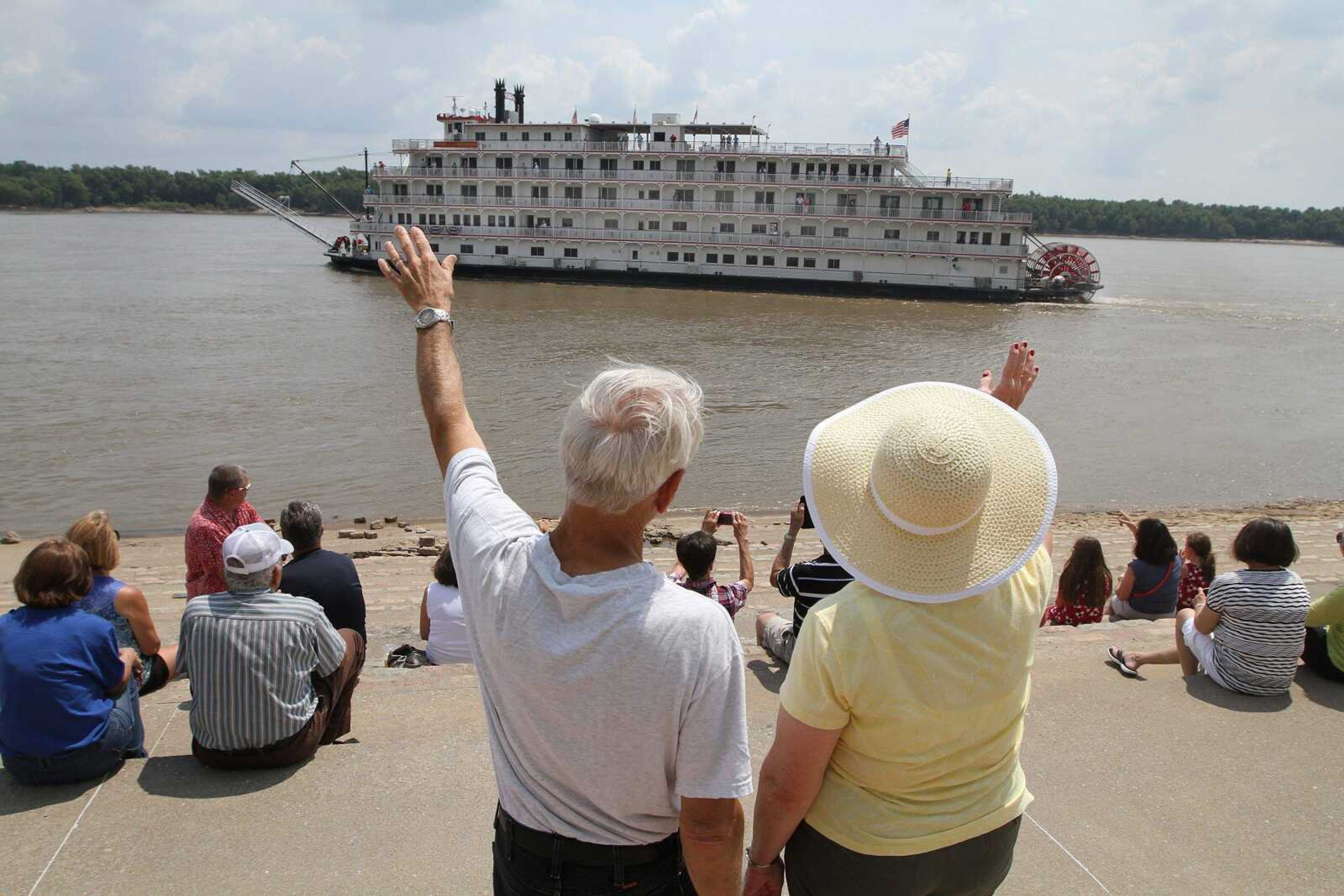 Al and Rosemary Bruzan wave goodbye to the Queen of the Mississippi after spending most of Thursday morning docked in Cape Girardeau. (GLENN LANDBERG)