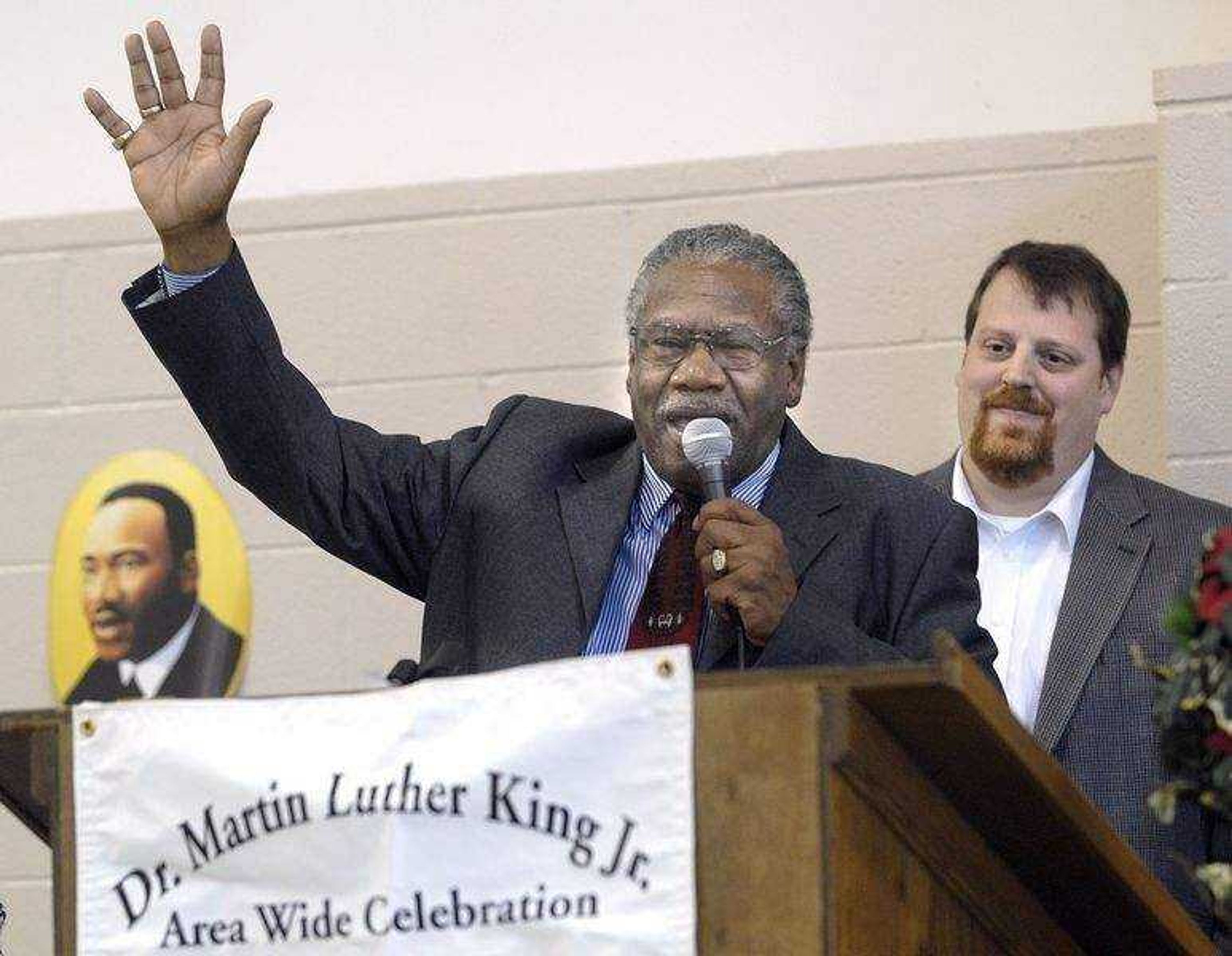 FRED LYNCH ~ flynch@semissourian.com<br>The Rev. Johnny Thomas expresses appreciation to the Rev. Rob Mehner, right, and the members of LaCroix Church who received a C. John Ritter Humanitarian Award at the Dr. Martin Luther King Jr. Humanitarian Luncheon Monday at the Osage Community Centre. The church built a new house for Thomas last year.