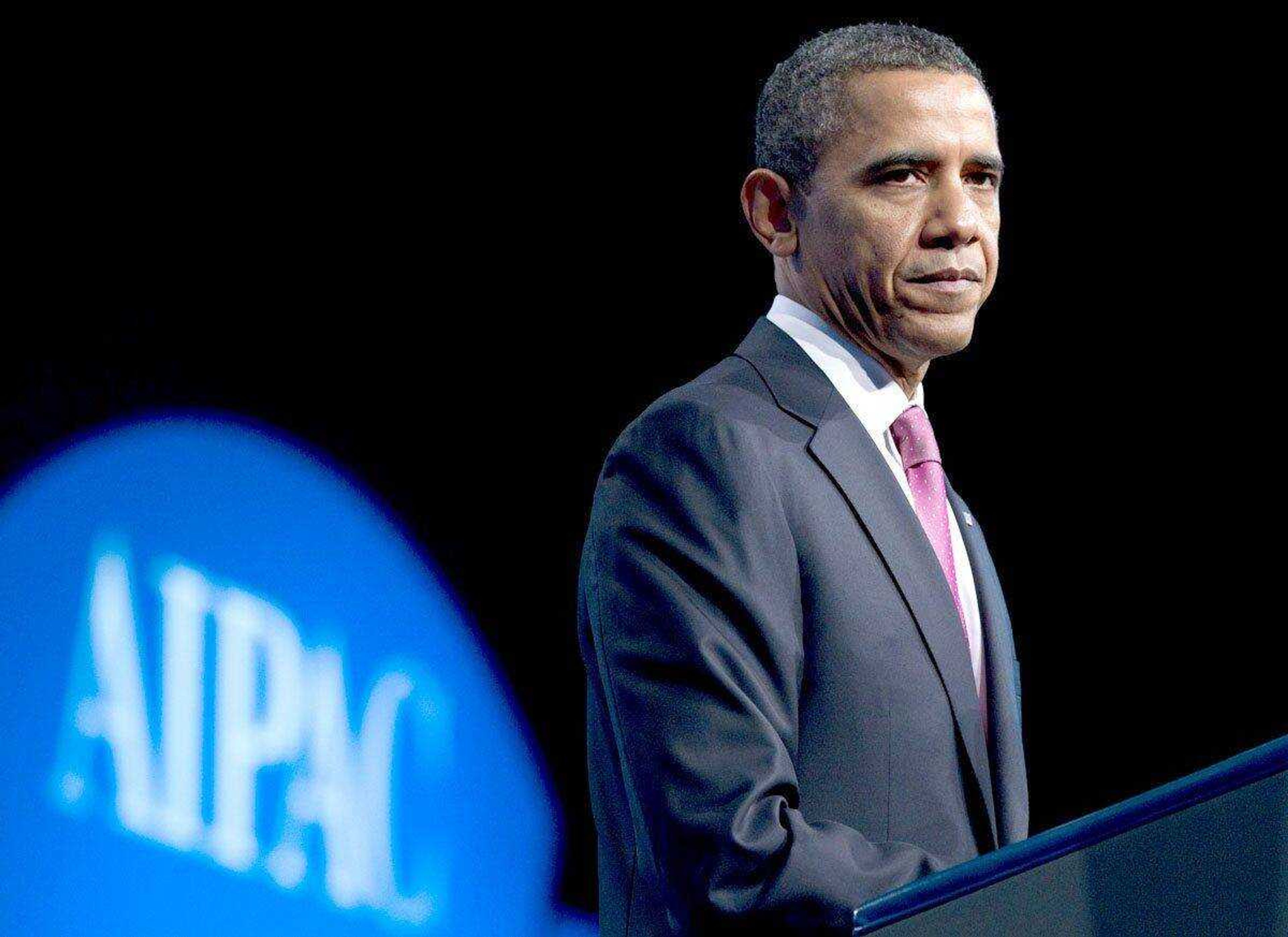 President Barack Obama pauses as he addresses thousands at the opening session of the American Israel Public Affairs Committee&#8217;s annual policy conference Sunday in Washington. (Carolyn Kaster ~ Associated Press)