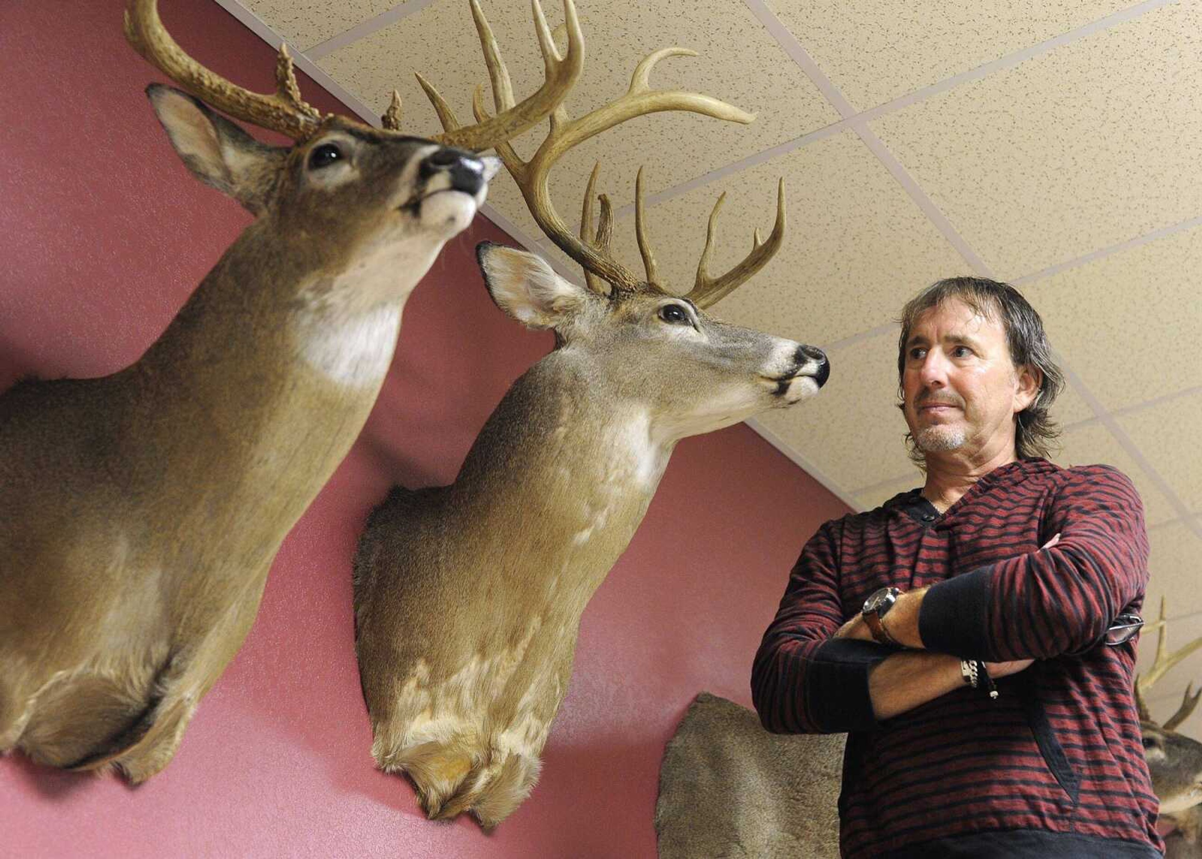 Jeff Bollinger displays some of his successful deer-hunting experiences.