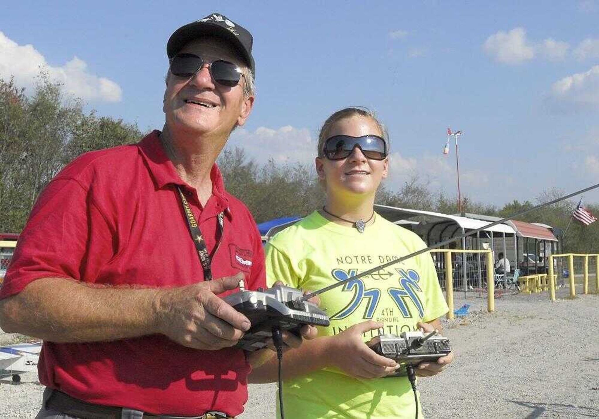 John Brown and his granddaughter, Cassie Hahs, flew a model airplane together on Sunday at the Galaxy Park Model Airfield. (Fred Lynch)