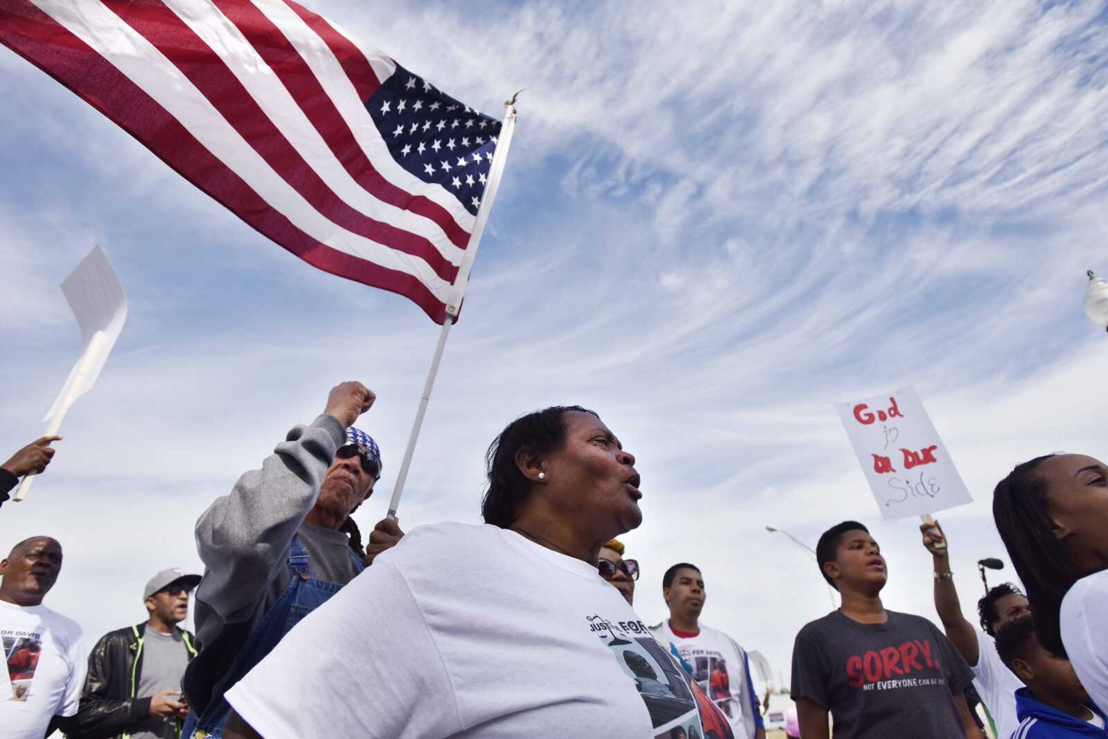 Jennett McCaster, David Robinson's mother, along with supporters, make a stop in the parking lot of the Sikeston Department of Public Safety on Saturday, Nov. 5, 2016 during the David Robinson Freedom March.