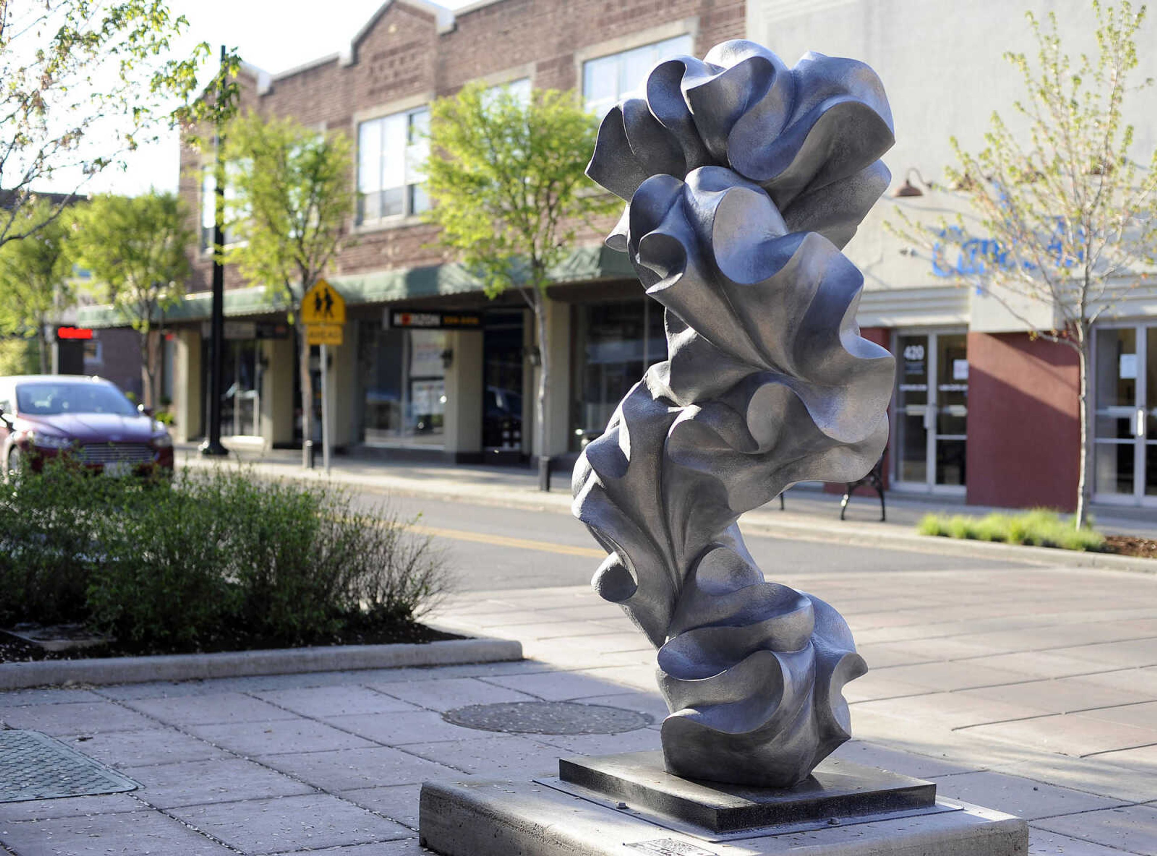 "Depth of Form," a sculpture by Jacob Burmood of Springfield, Missouri, is seen on Broadway west of Fountain Street on Friday, April 15, 2016 in Cape Girardeau.