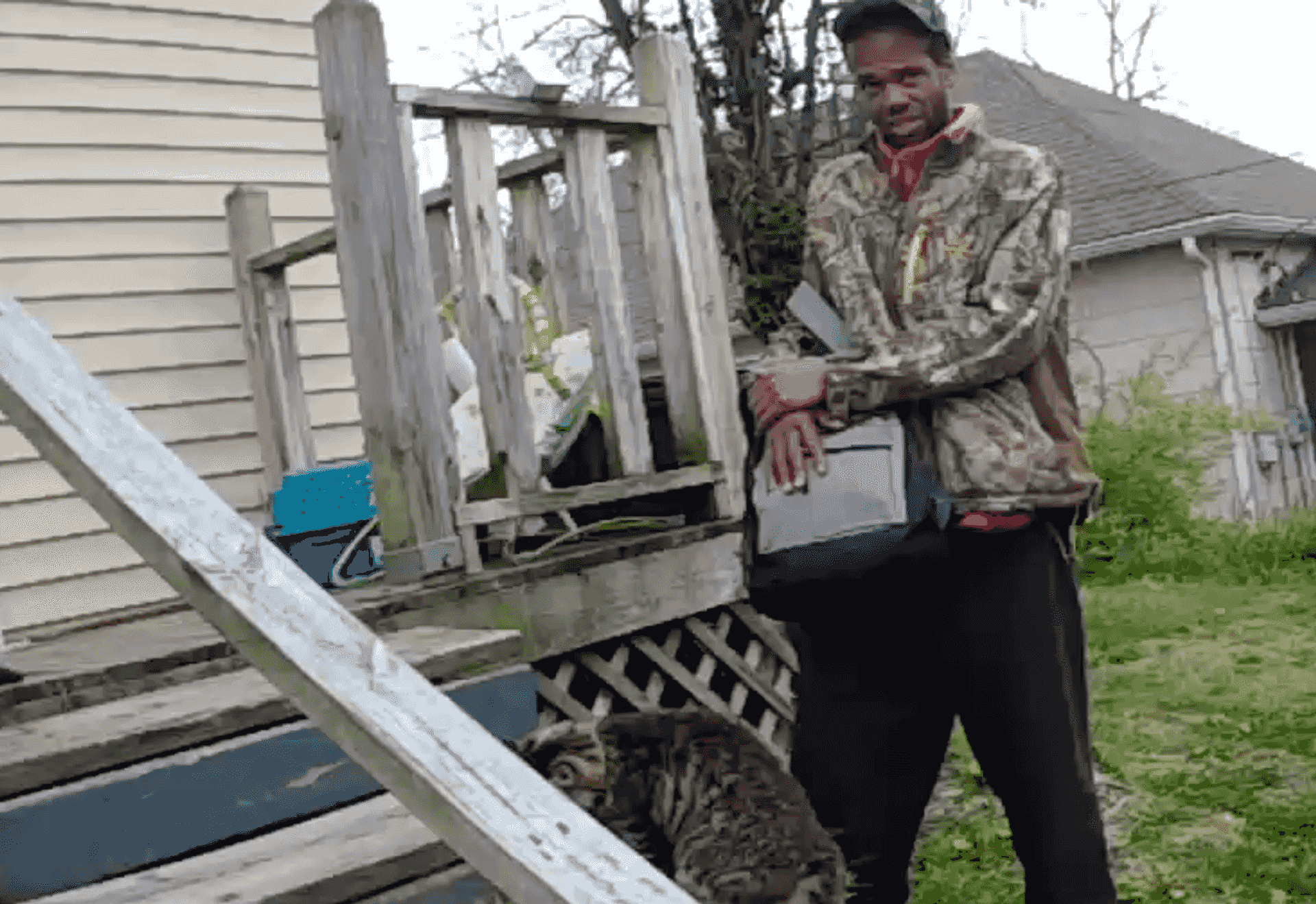 Ryan Mosley stands in front of a house where residents had called police on a complaint of trespassing. When Cape Girardeau police officer Joseph Whistler arrived, Mosley was talking with the neighbors who were on the front porch.