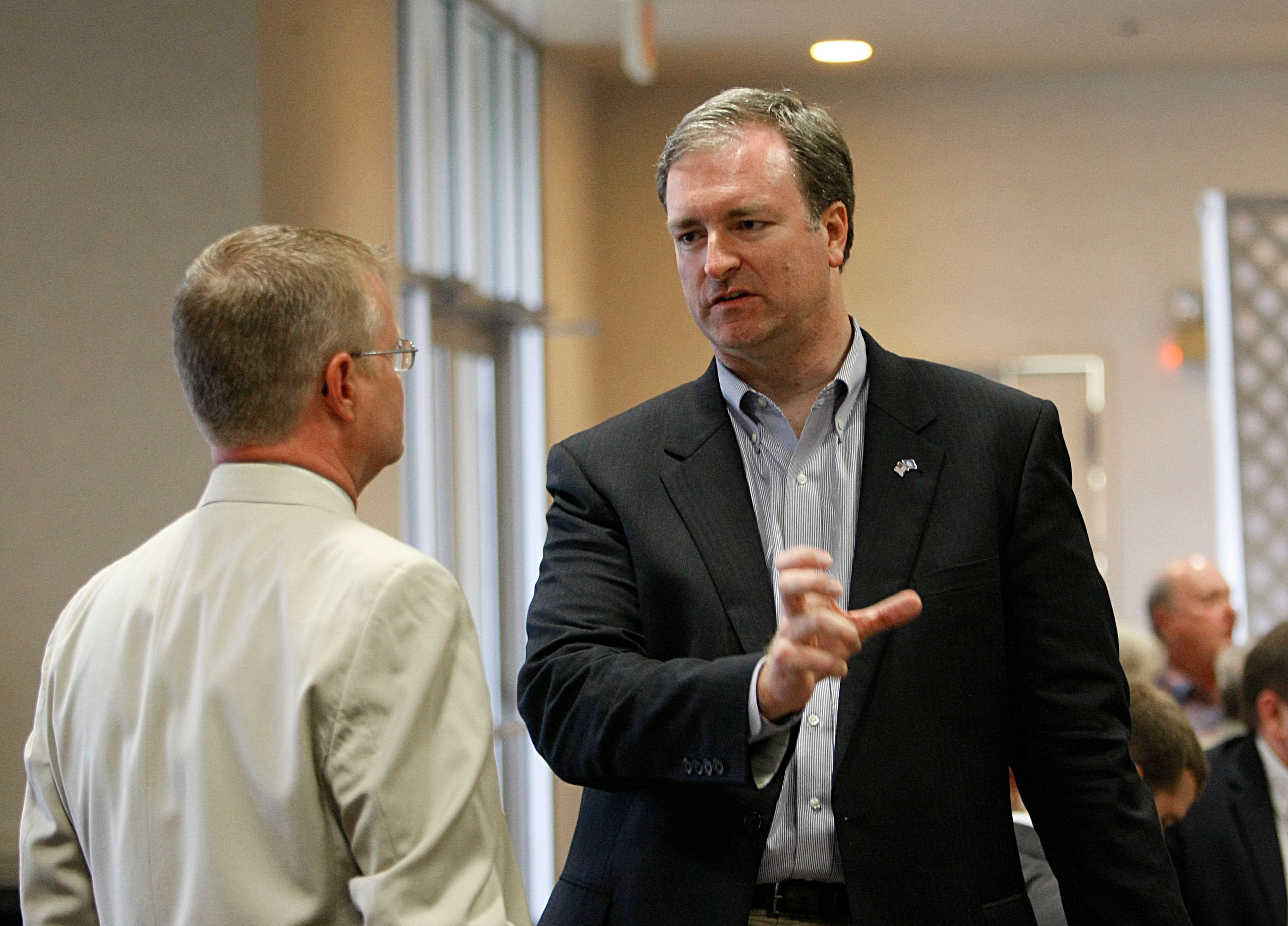 FILE - Republican U.S. Senate candidate Trey Grayson, right, talks with state Rep. Damon Thayer, R-Georgetown, during a Republican dinner in Georgetown, Ky., May 15, 2010. (AP Photo/Ed Reinke, File)