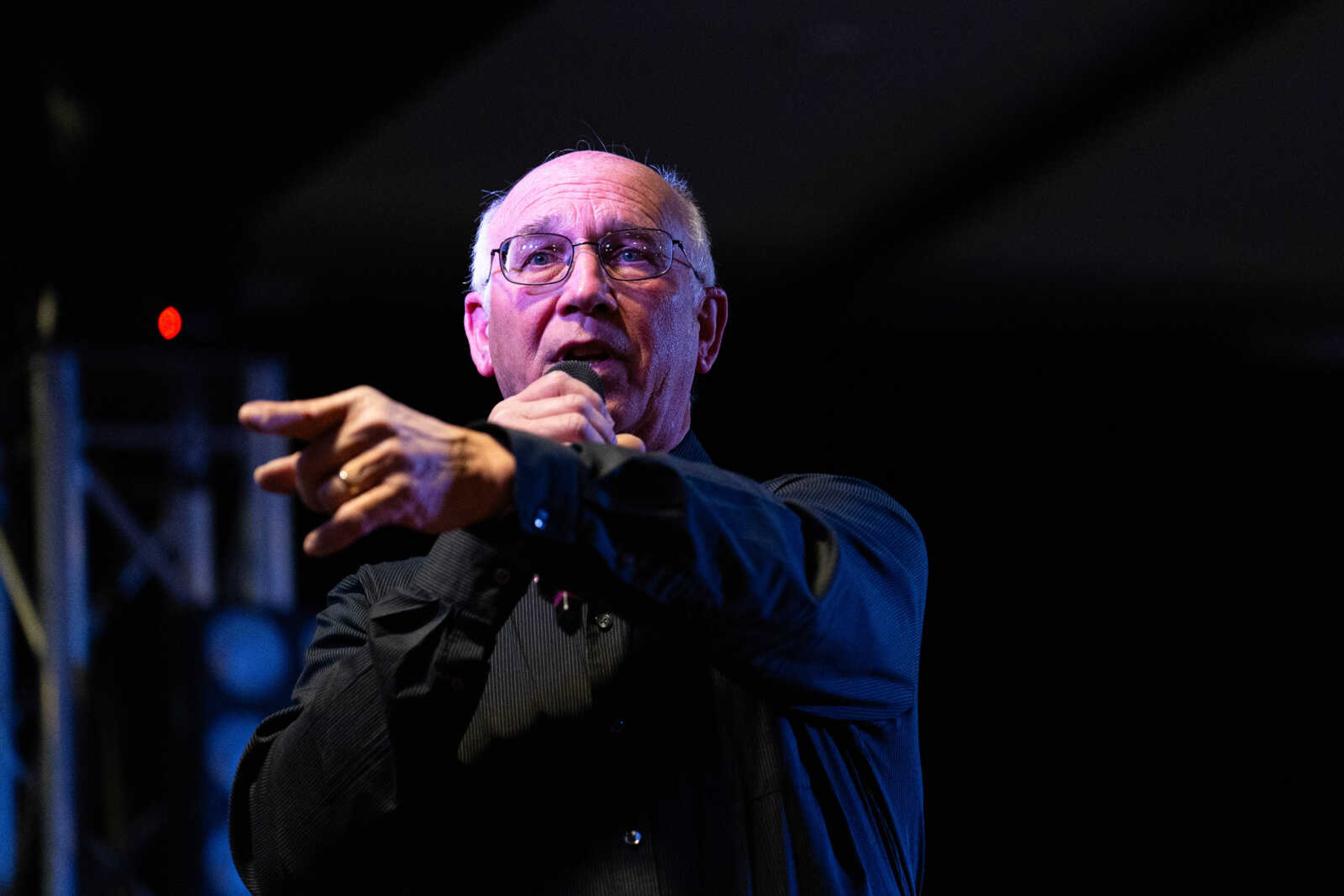 Auctioneer Jerry Tuschhoff facilitates the live auction at The Friends Gala at the Drury Conference Center.