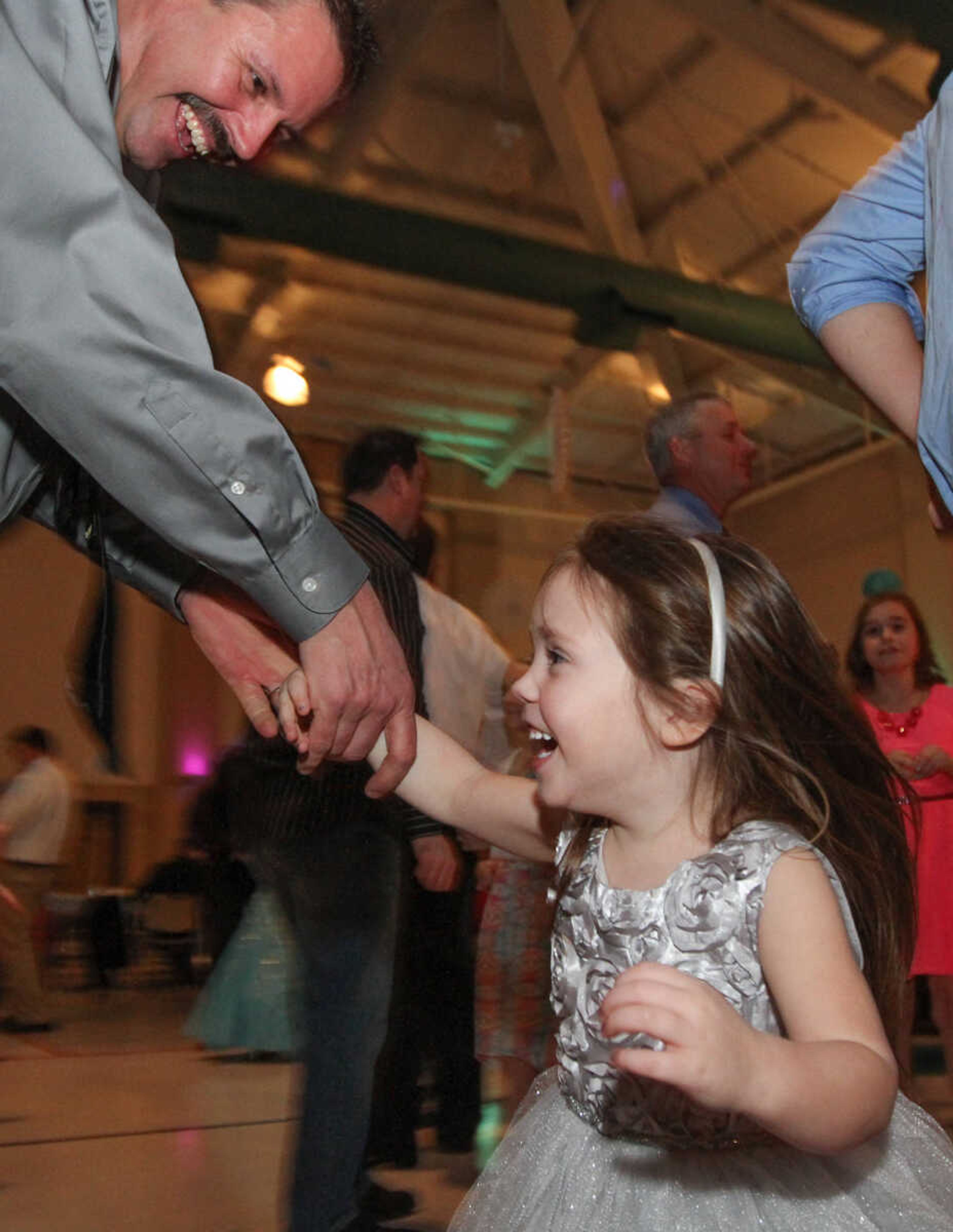 GLENN LANDBERG ~ glandberg@semissourian.com


Jeff Wendel twirls his daughter Charley during the 7th annual Father/Daughter Dance Saturday, Feb. 21, 2015 at the Osage Centre.