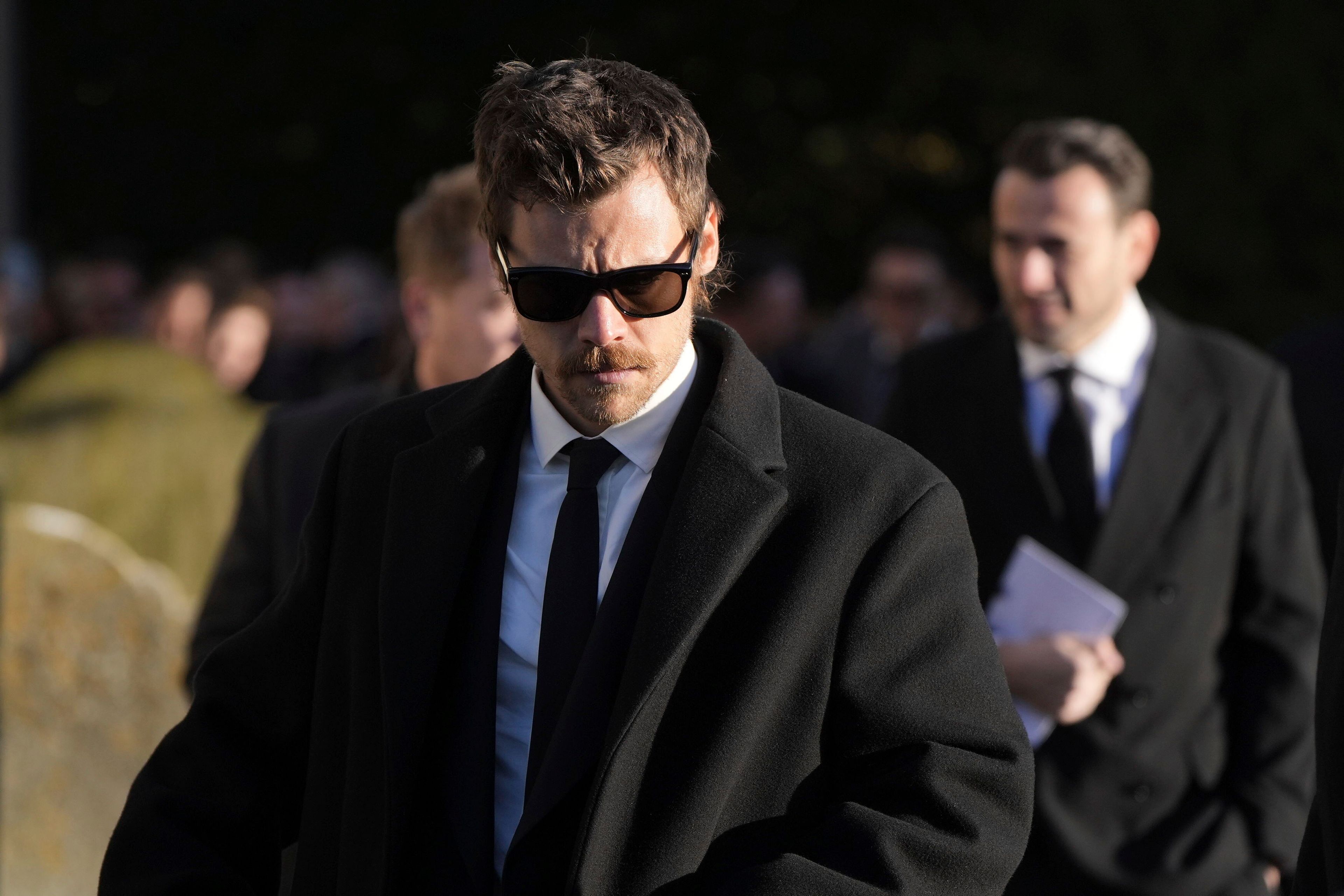 Harry Styles walks after the funeral service of One Direction singer Liam Payne at St Mary's Church in Amersham, England, Wednesday, Nov. 20, 2024. (Andrew Matthews/PA via AP)