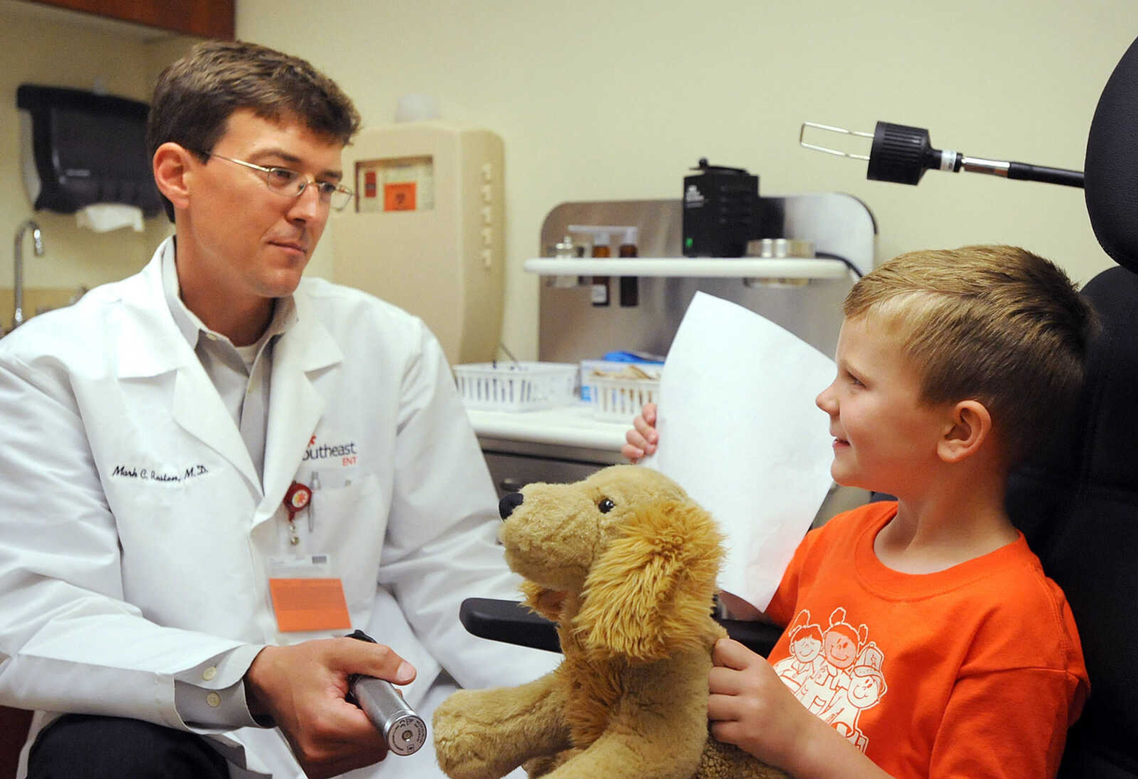 LAURA SIMON ~ lsimon@semissourian.com

Britt Crowden takes his stuffed dog Snow in to see Dr. Mark C. Rusten Tuesday morning, April 30, 2013 at SoutheastHEALTH Primary Care in Cape Girardeau. Big Stuff preschool students got to bring their stuffed animals, ranging from teddy bears to tigers, in for exams Tuesday.