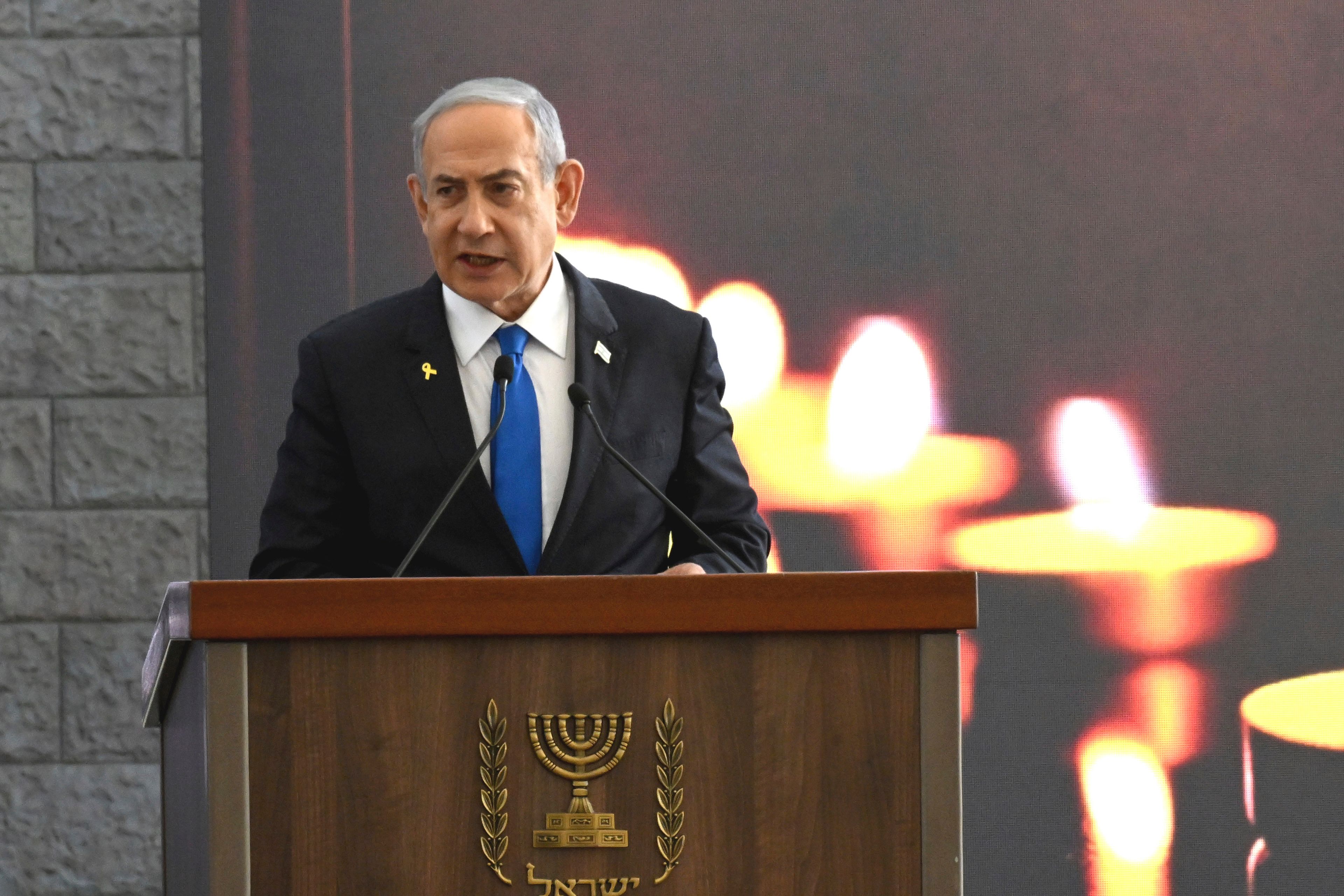 Israeli Prime Minister Benjamin Netanyahu speaks at a memorial ceremony for those killed by Hamas on Oct. 7, 2023, and those who fell in the "Iron Sword" war, at the Knesset, the Parliament, in Jerusalem, Monday, Oct. 28, 2024. (Debbie Hill, Pool Photo via AP)