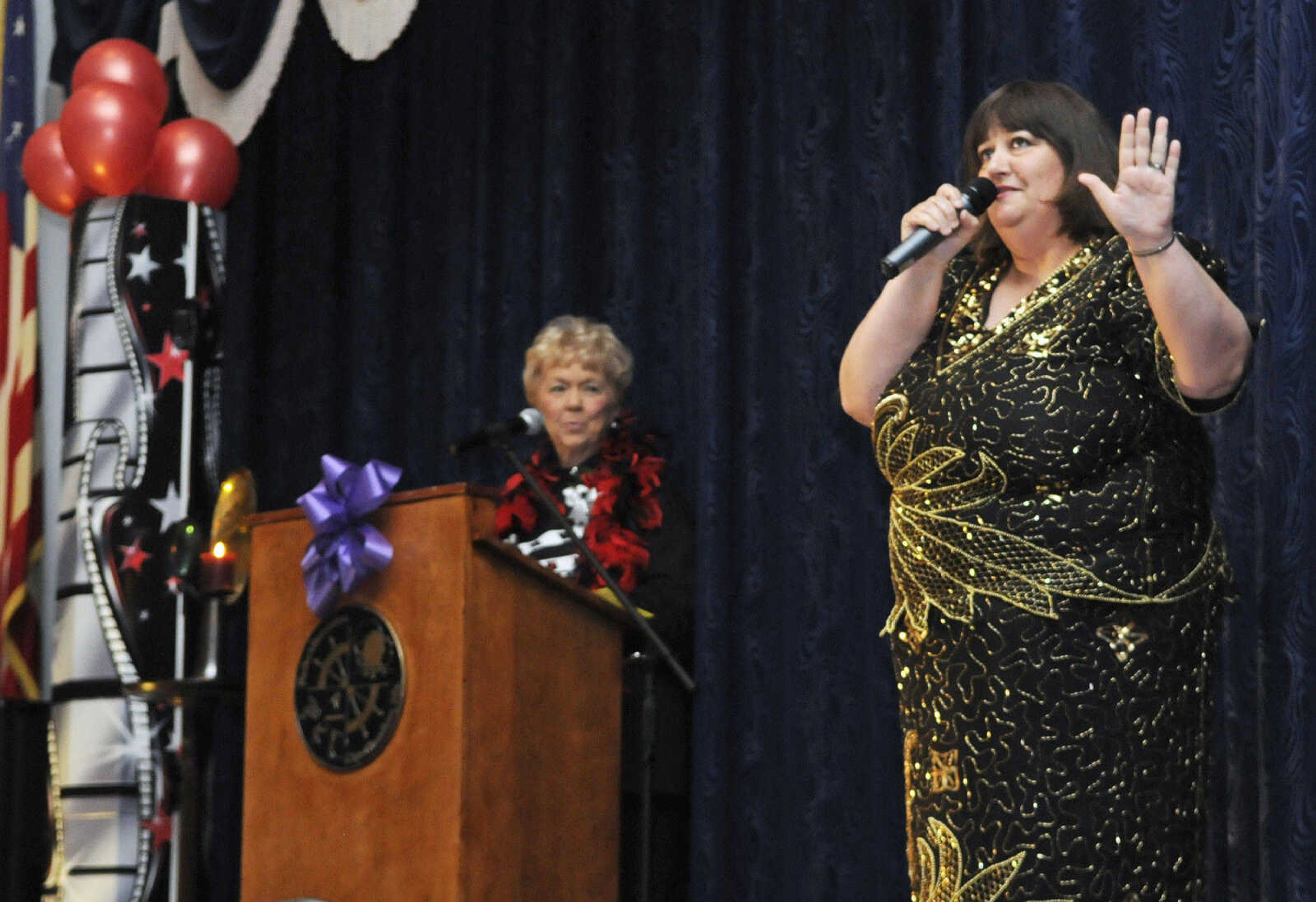 KRISTIN EBERTS ~ keberts@semissourian.com

Vickie Hoffman, RN-BC, performs during the 2010 Celebration of Nursing at A.C. Brase Arena in Cape Girardeau, Mo., on Wednesday, May 5. Over 400 area nurses attended the celebration. The night's theme was "Hollywood Salutes Nursing."