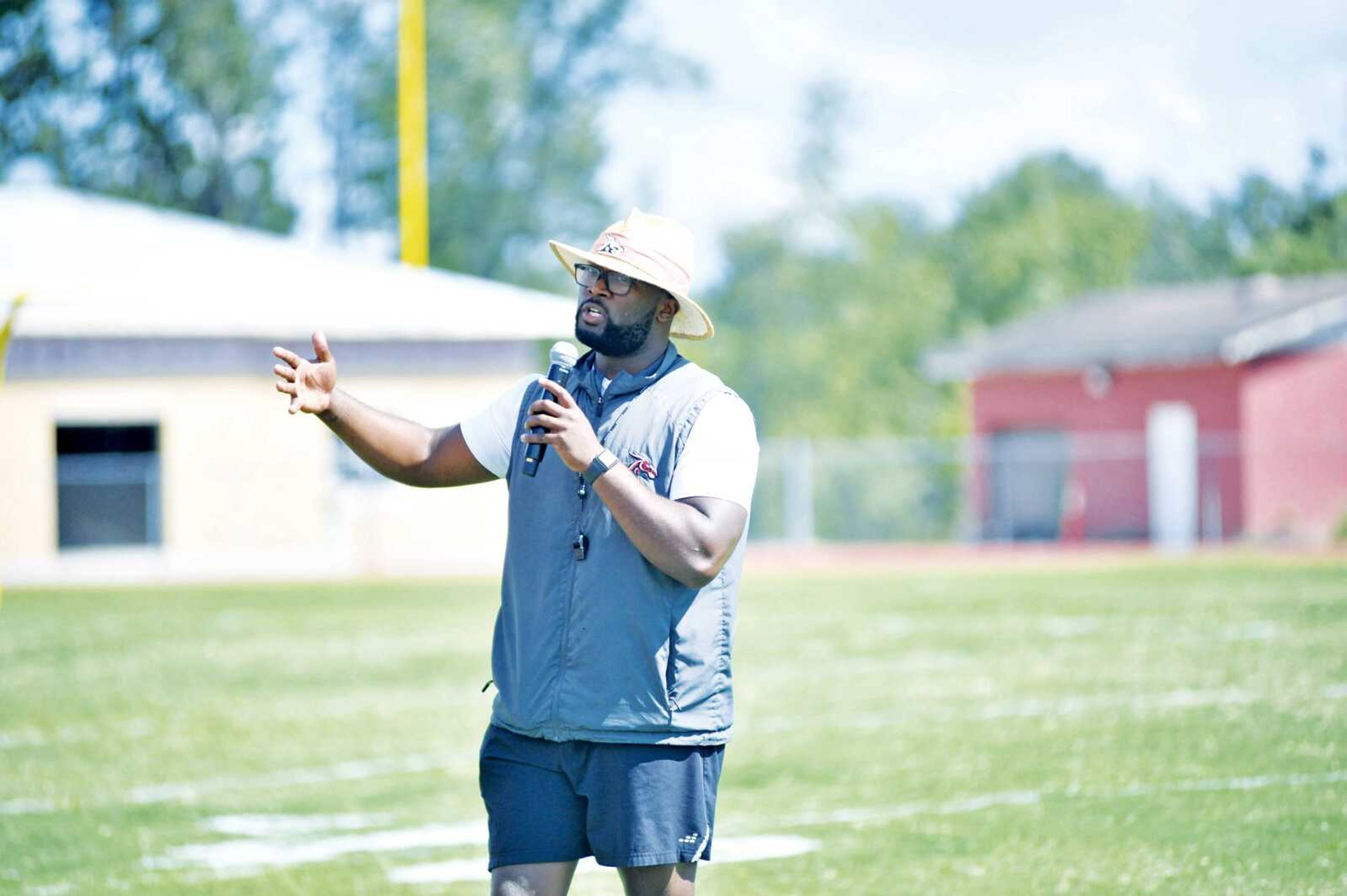 PBYFL Commissioner Austin Jefferson speaks to the fans before kickoff on Saturday morning at Poplar Bluff Junior High School.