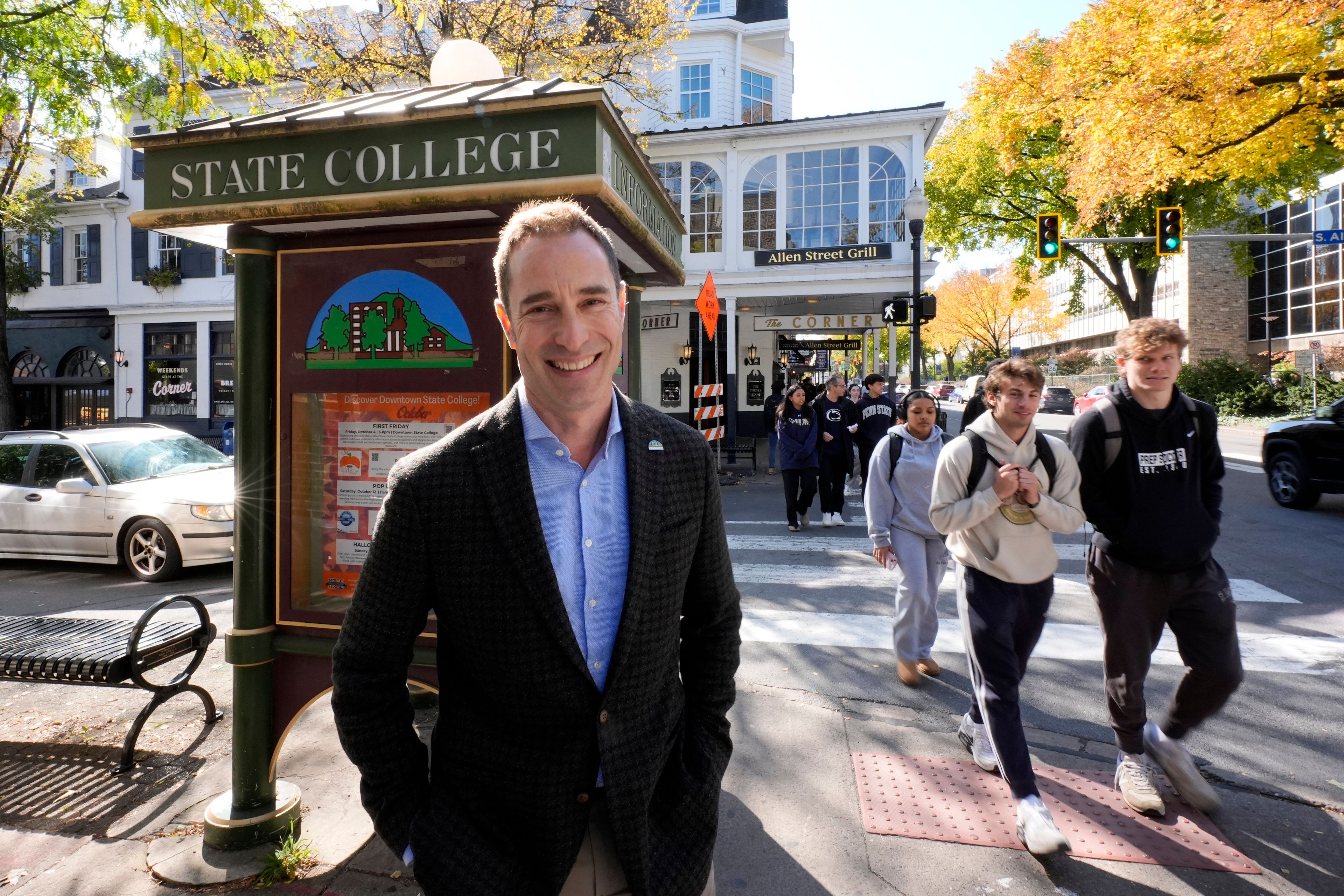 Mayor of State College, Pa., Ezra Nanes stands at the corner of Allen Street and College Ave. in downtown State College, Friday, Oct. 18, 2024. (AP Photo/Gene J. Puskar)