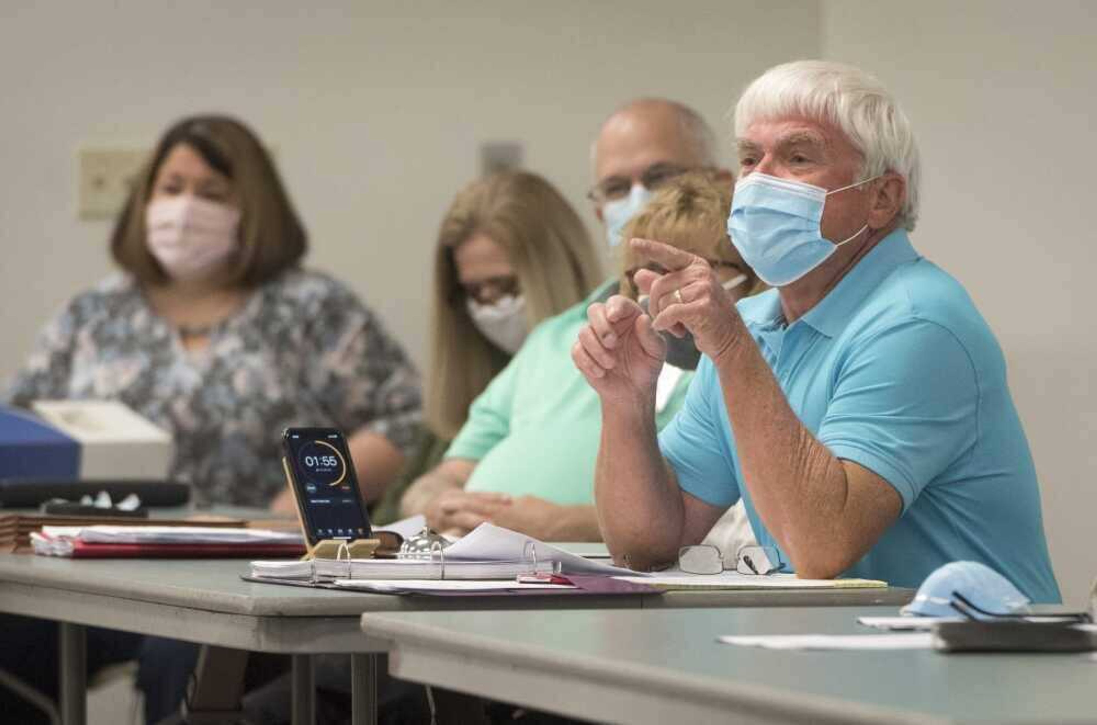 Cape Girardeau County Public Health Center board member John Freeze asks a speaker to provide a source for information cited regarding COVID-19 fatality rates Aug. 25 during a Board of Trustees meeting at the Osage Centre in Cape Girardeau.