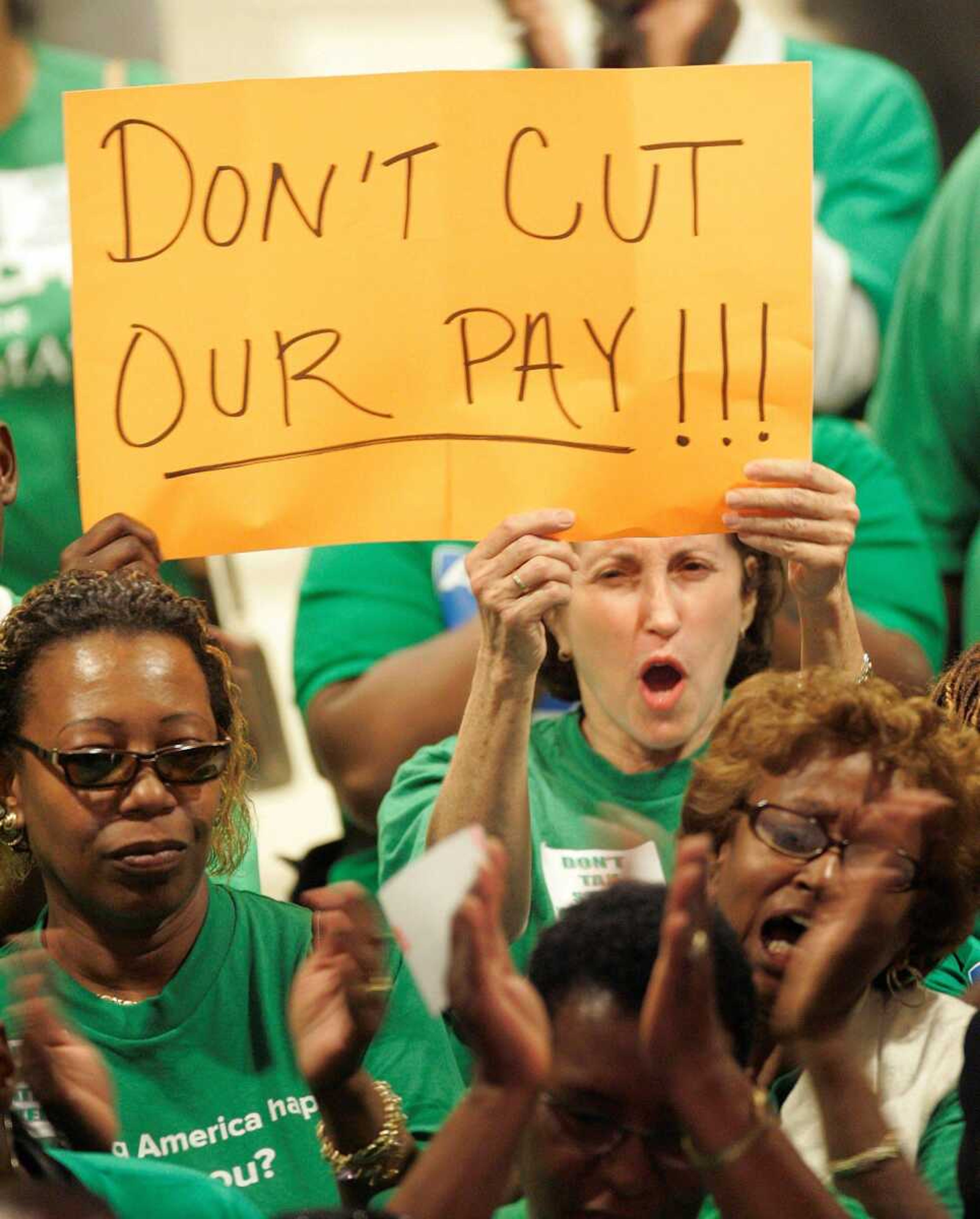 FILE In this Friday, April 24, 2009 file photo, state workers gather at the Capitol to protest their proposed pay cuts in the Florida budget, in Tallahassee, Fla. If you thought state budgets were in bad shape last year, just wait: 2010 promises to be brutal for lawmakers _ many facing re-election _ as they scramble to find enough money to keep their states running without raising taxes. (AP Photo/Phil Coale, File)