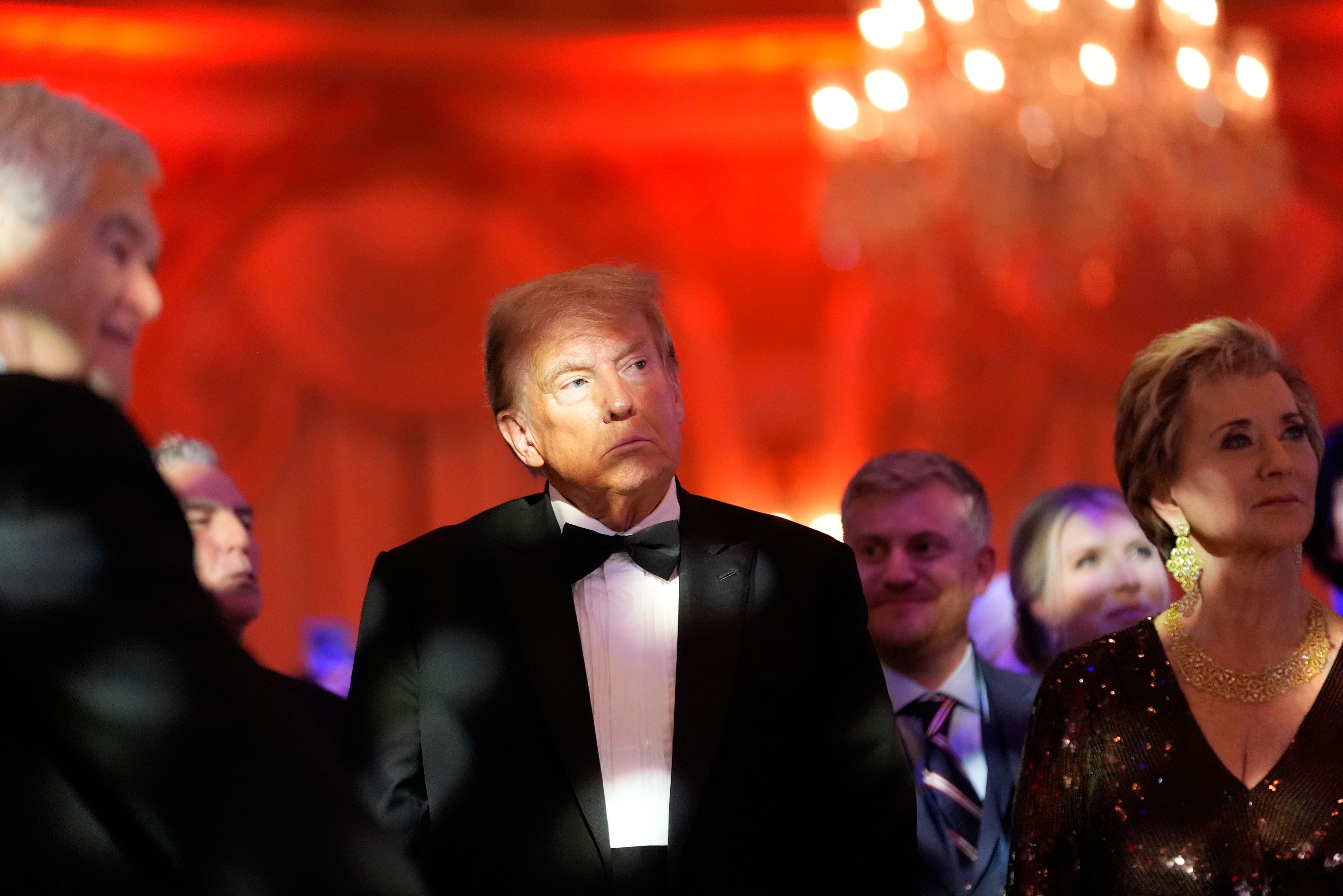 President-elect Donald Trump listens during an America First Policy Institute gala at his Mar-a-Lago estate, Thursday, Nov. 14, 2024, in Palm Beach, Fla. (AP Photo/Alex Brandon)