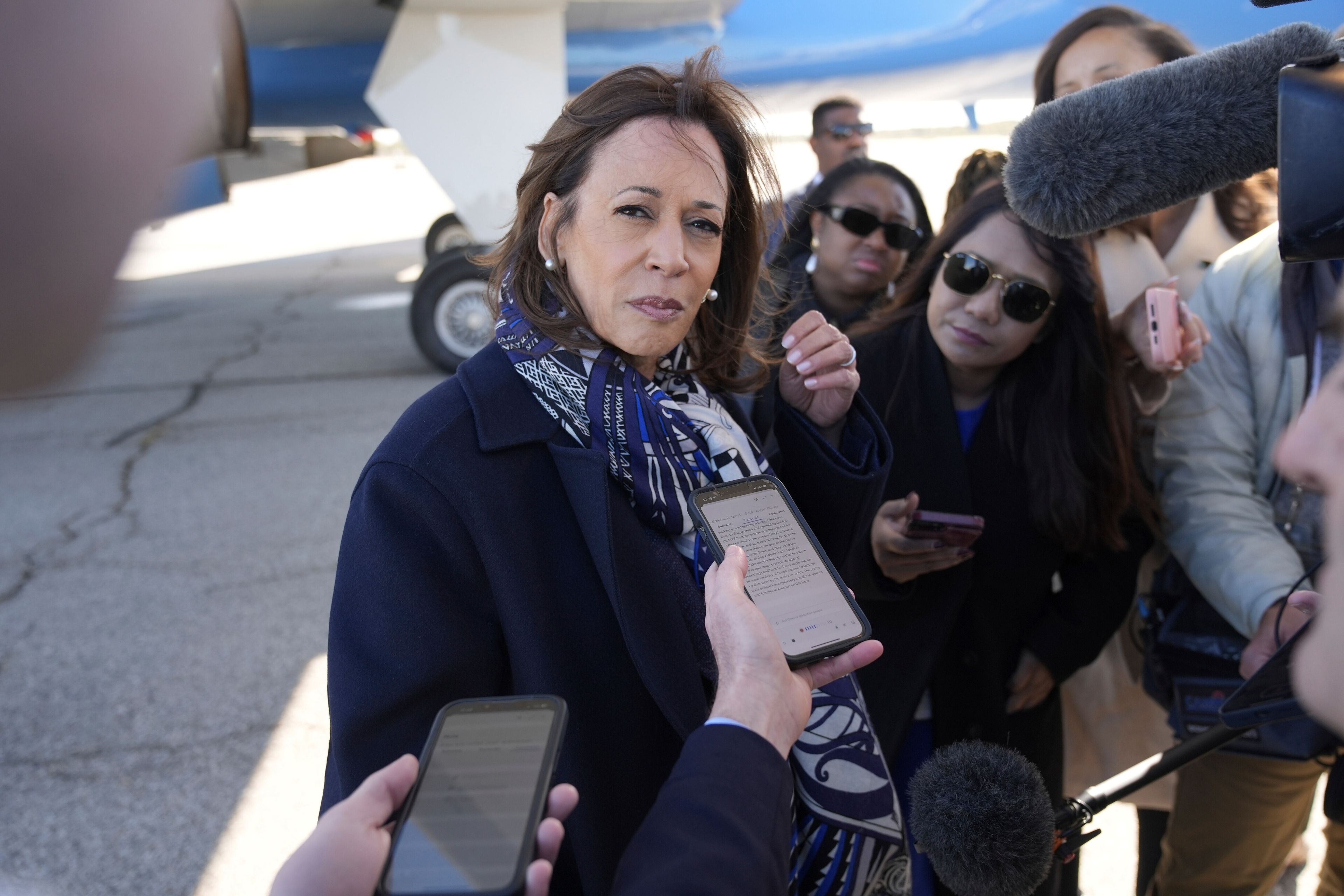 Democratic presidential nominee Vice President Kamala Harris speaks to the media before boarding Air Force Two on departure from Detroit, at Detroit Metropolitan Wayne County Airport, Wednesday, Oct. 16, 2024. (AP Photo/Jacquelyn Martin)