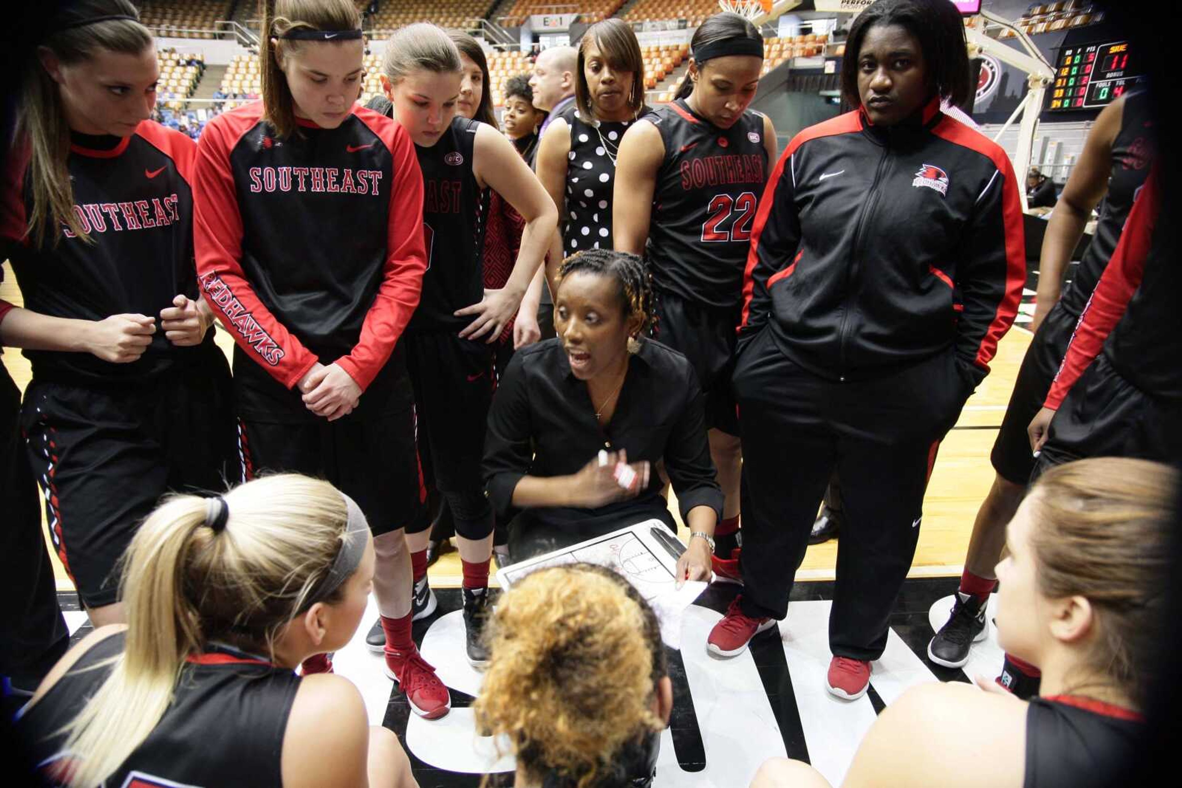 Southeast Missouri State coach Rekha Patterson talks to her team during a timeout in the Redhawks’ OVC tournament quarterfinal game Thursday in Nashville, Tennessee. SIU Edwardsville won 80-76 loss in overtime.