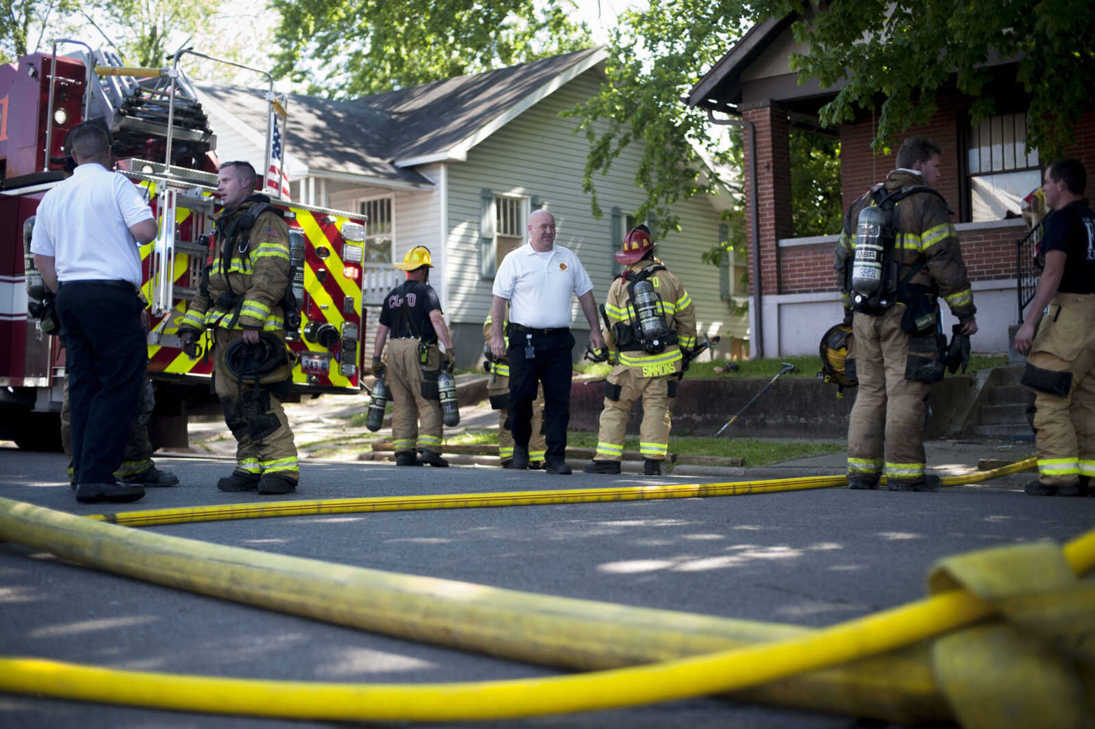 Members of the Cape Girardeau Fire Department respond to the scene of a structure fire Monday, May 11, 2020, at 40 North Henderson Ave. in Cape Girardeau.