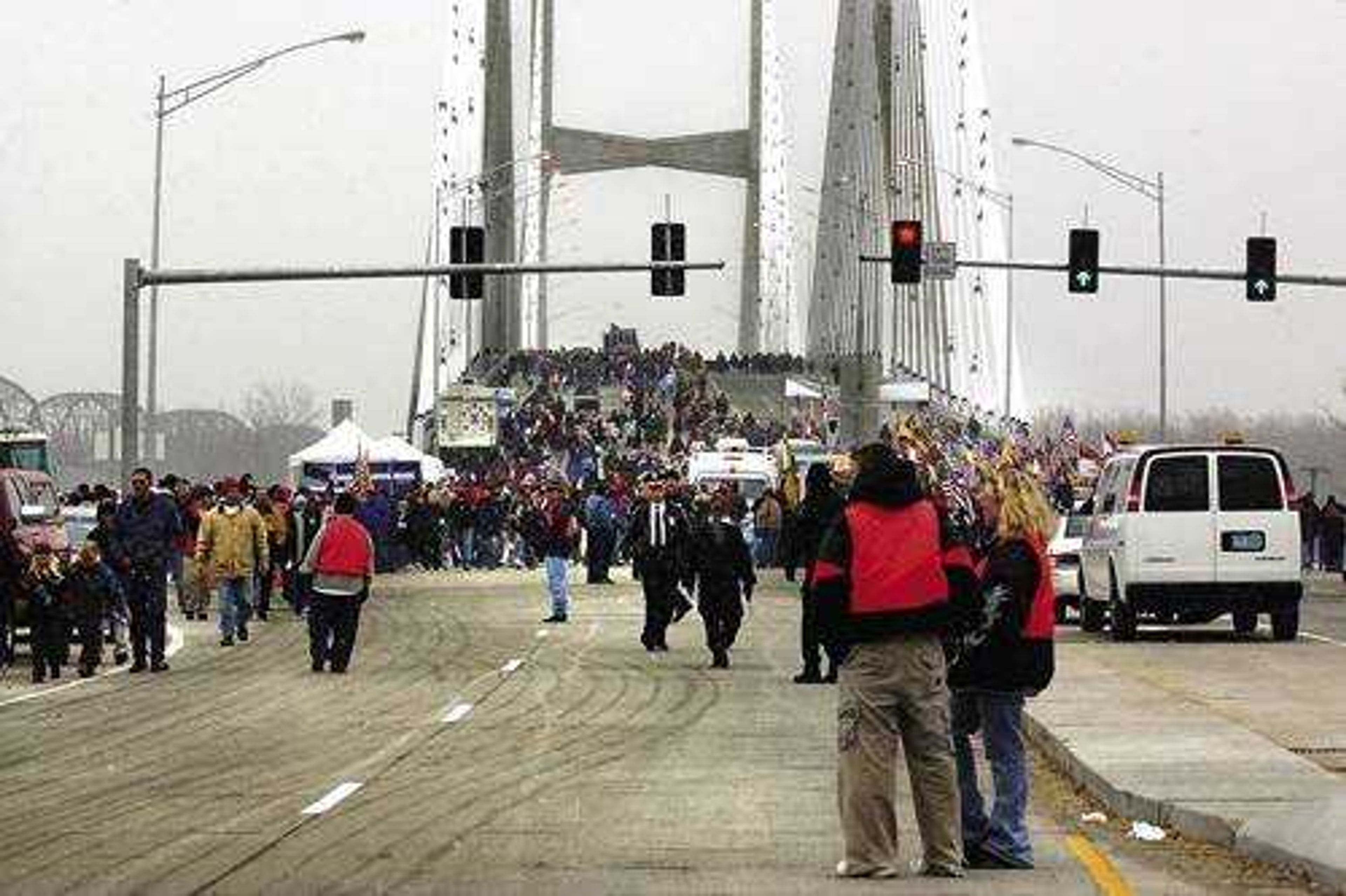 Crowds move about the soon-to-be-opened Bill Emerson Memorial Bridge prior to the grand opening ceremonies.