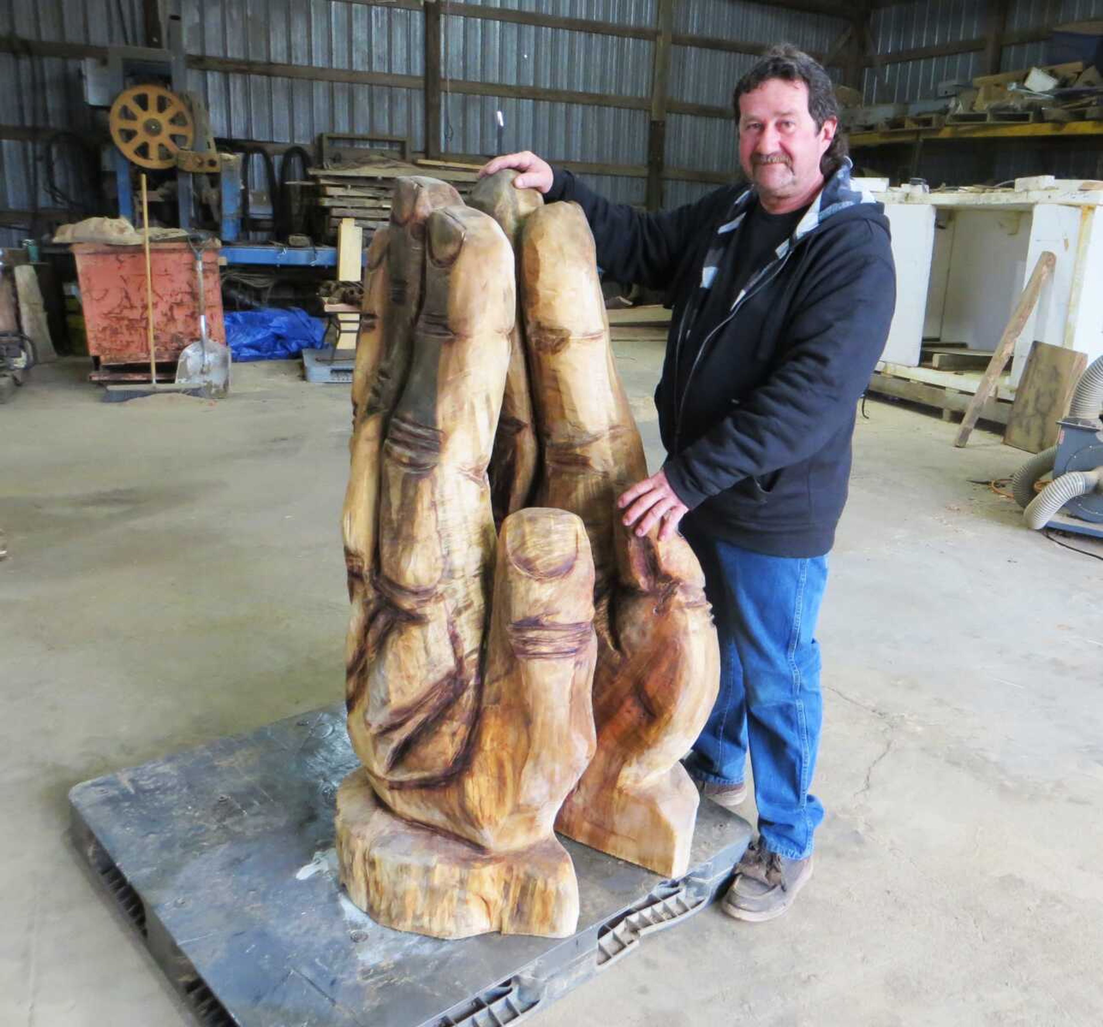 Chainsaw artist Bob Weston of Grassy, Missouri, carved this piece for this weekend's Stations of the Cross Easter display at Magnolia Park in Marble Hill, Missouri.