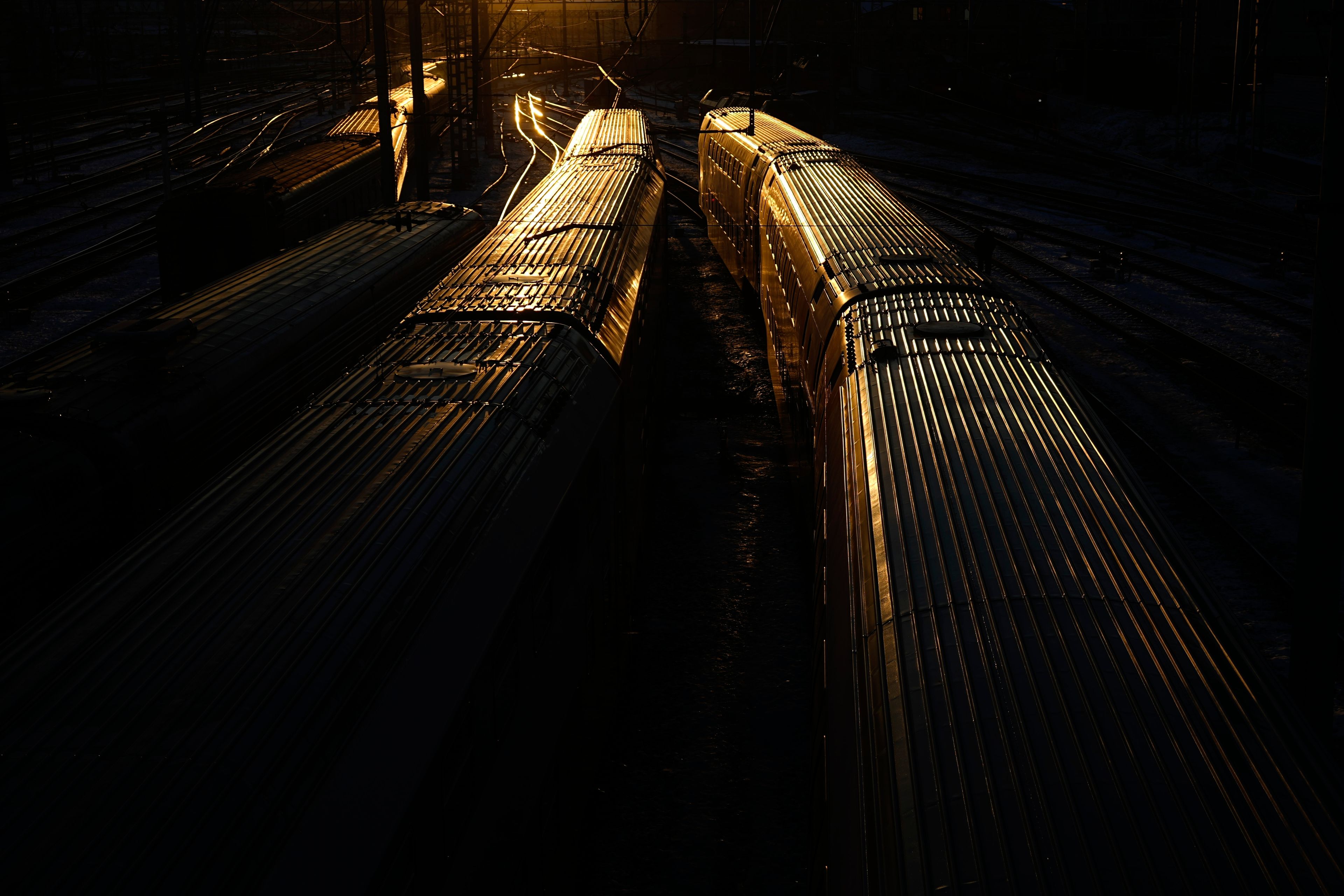 A Russian Railways double-decker trains are seen parked on the rails of the Kazansky railway line in Moscow, Russia, Tuesday, Nov. 26, 2024. (AP Photo/Pavel Bednyakov)