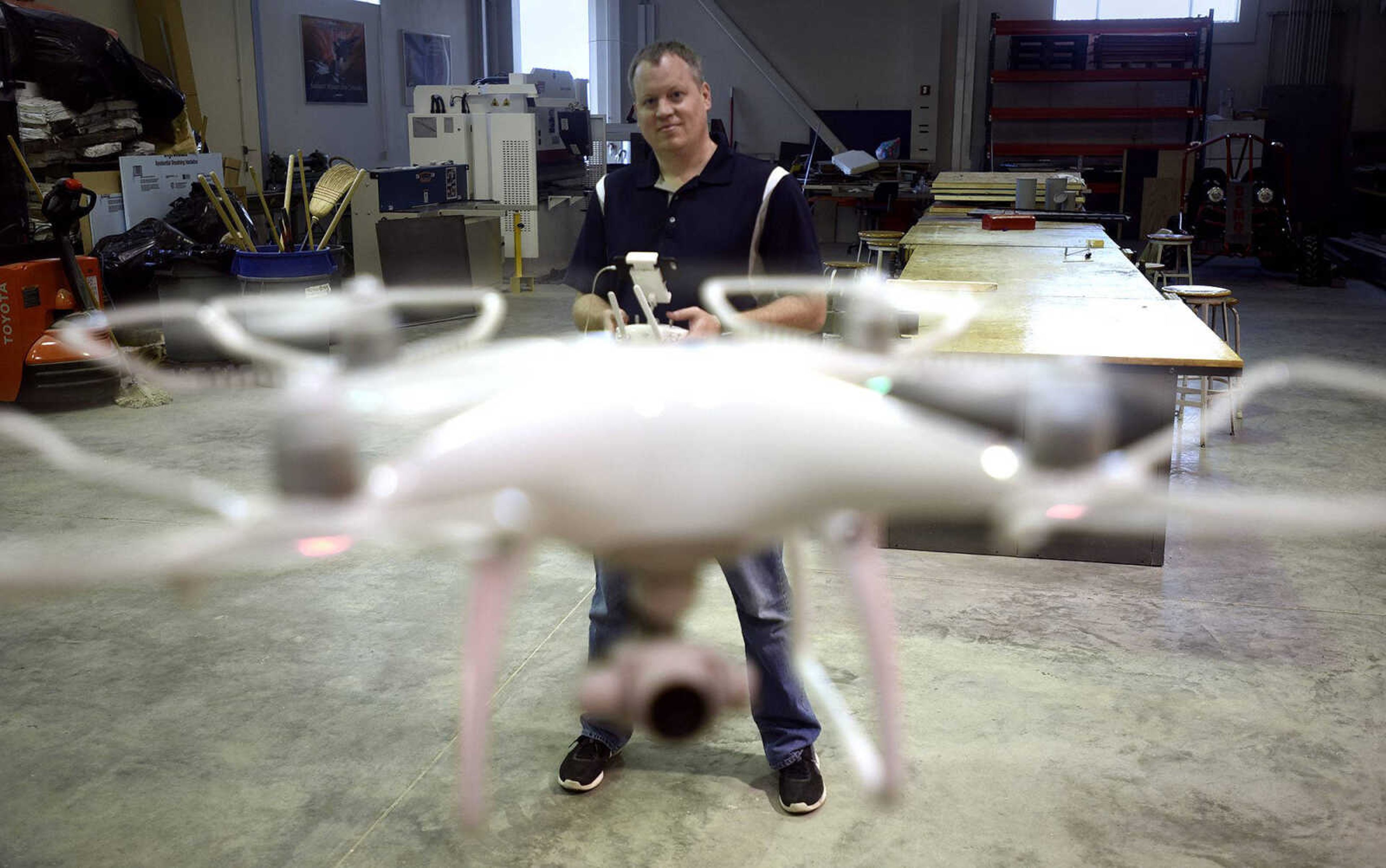 Brad Deken flies a drone inside Southeast Missouri State University's Polytech Building on Thursday in Cape Girardeau.