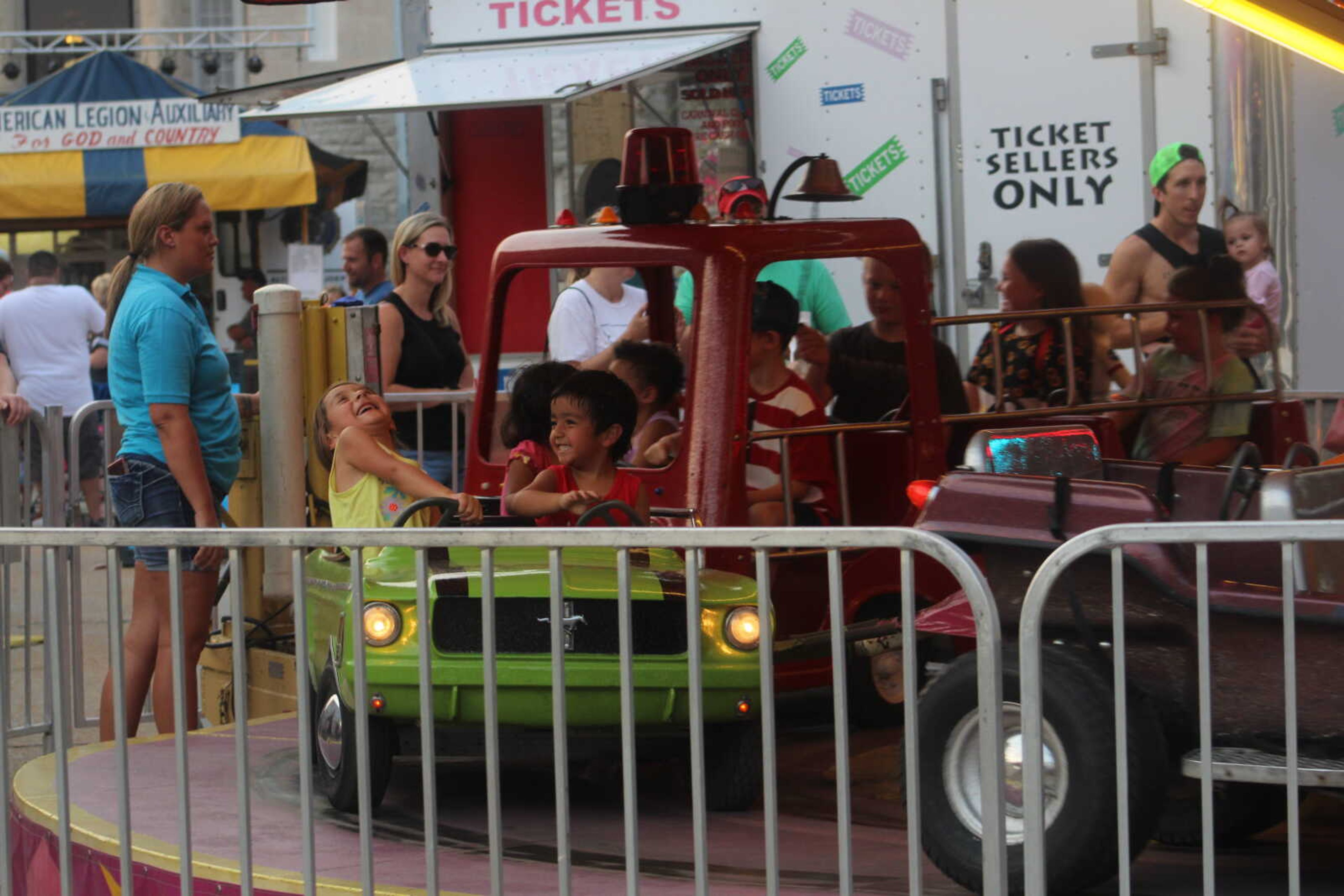 Children ride one of many rides at Jackson Homecomers on Wednesday, July 28, 2021, in Uptown Jackson.