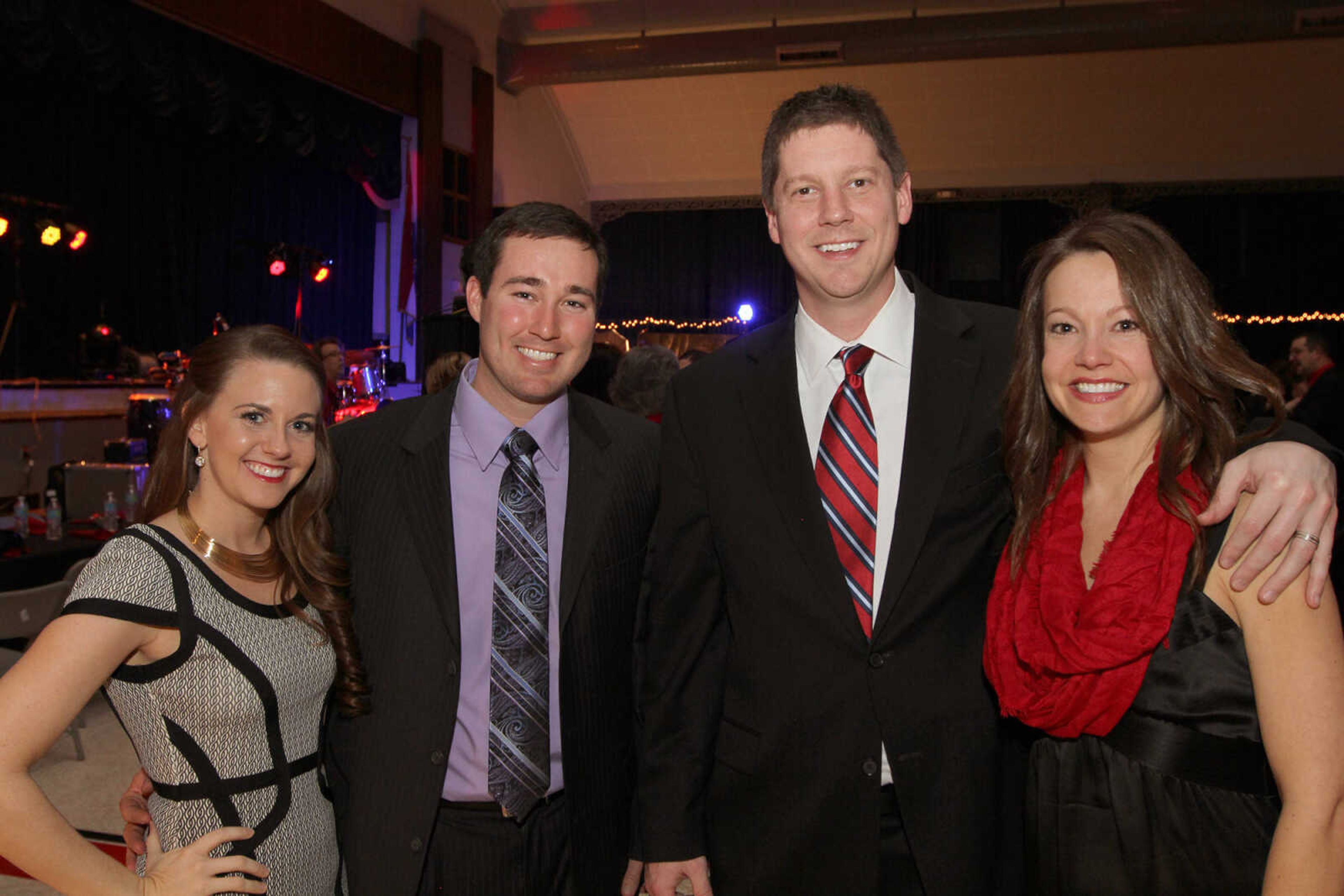 GLENN LANDBERG ~ glandberg@semissourian.com


Monica and Rex Meyr, left, pose for a photo with Mike and Jamie Harrison during the Red and Black Affair benefit for the Jackson R-2 Foundation Saturday, Feb. 7, 2015 at the Arena Building.