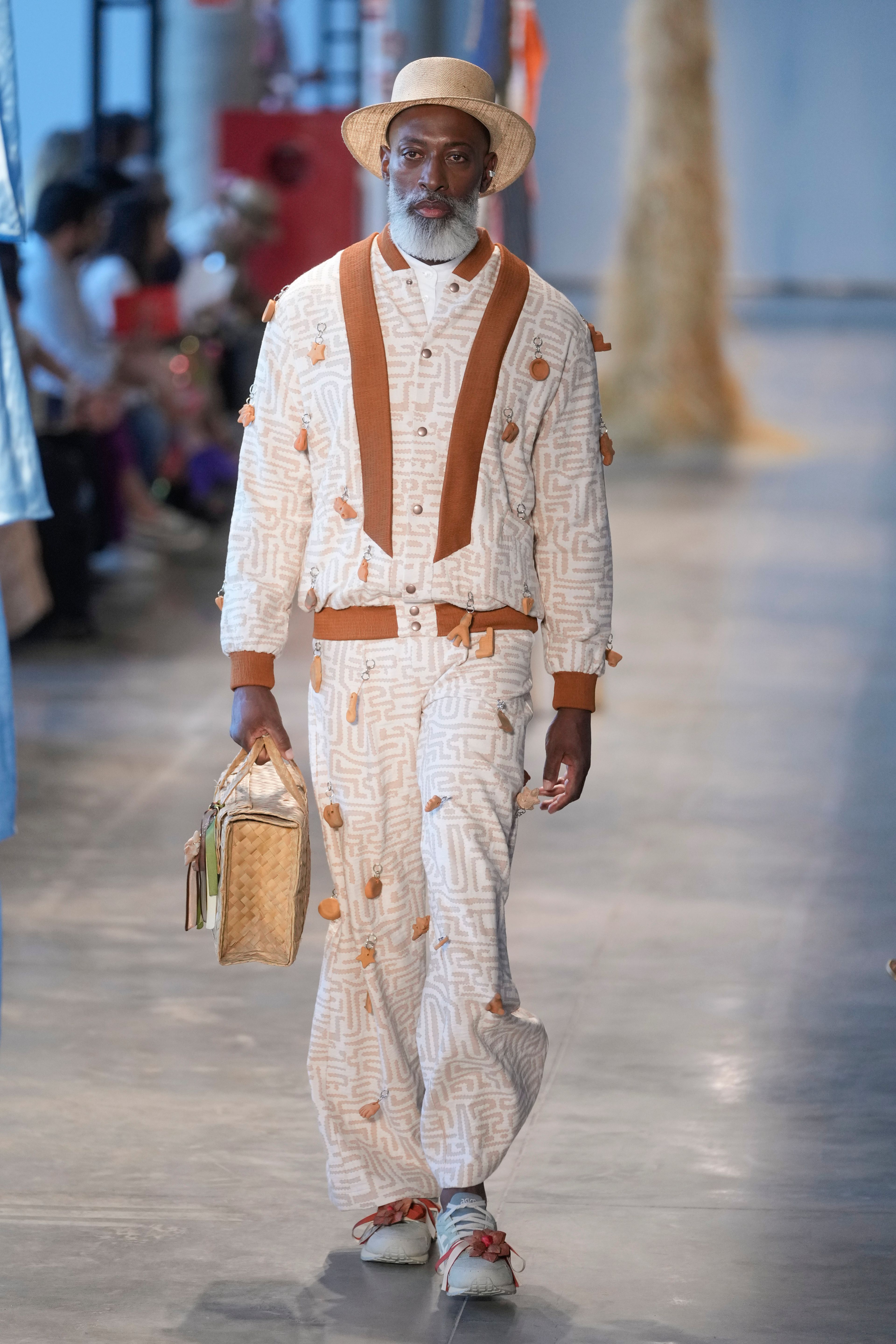 A model wears a creation from the Heloisa Faria collection during Sao Paulo Fashion Week in Sao Paulo, Brazil, Thursday, Oct. 17, 2024. (AP Photo/Andre Penner)