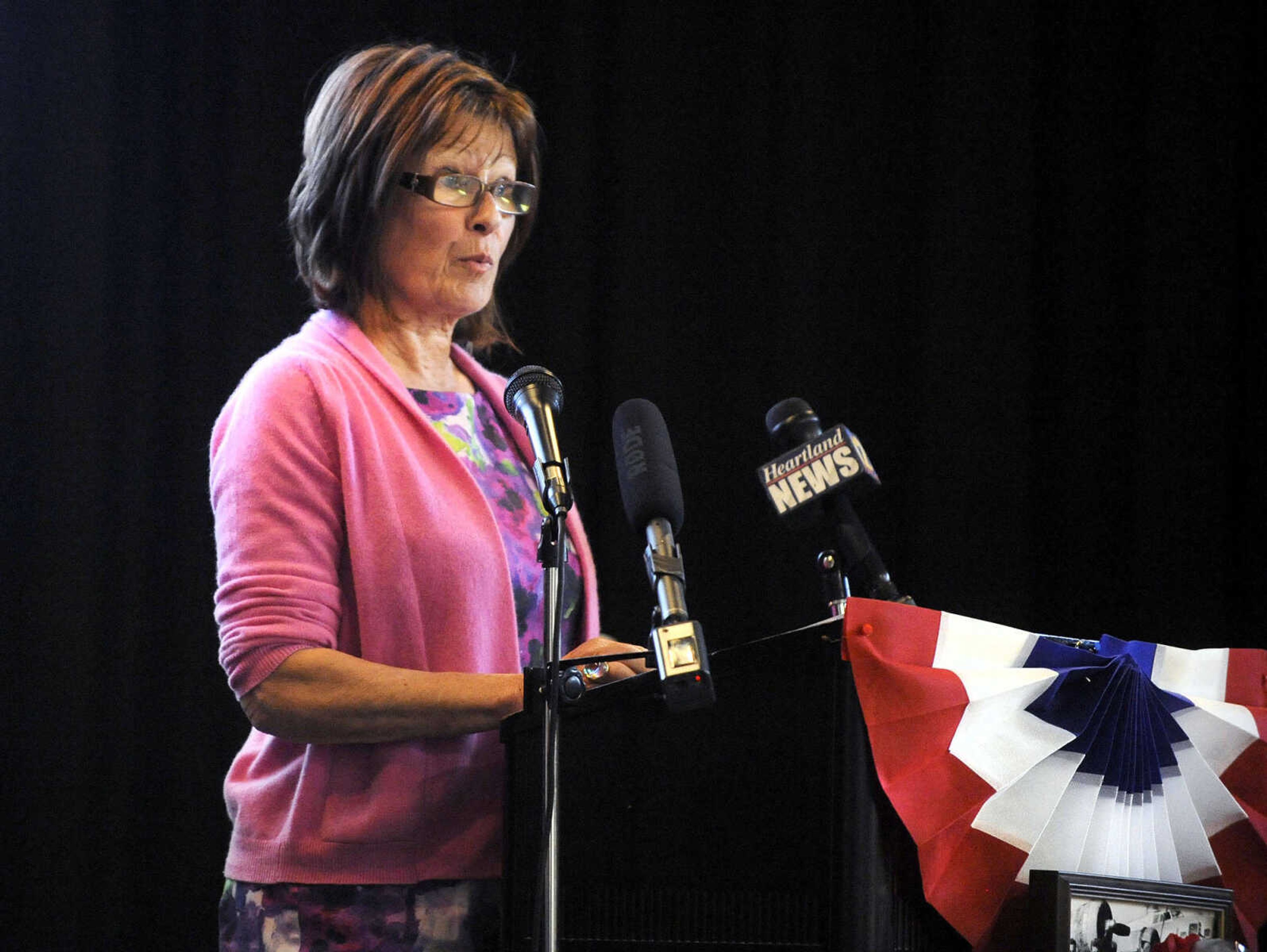 LAURA SIMON ~ lsimon@semissourian.com

Diane Gomersall speaks about Queen Alexandra's Nursing Corps First Lt. Megan Lewis on Monday, March 21, 2016, during the living history event honoring the WWII lost crew of the Flying Fortress 812, and the medal presentation to Sgt. Clifford Heinrich at Alma Schrader Elementary.