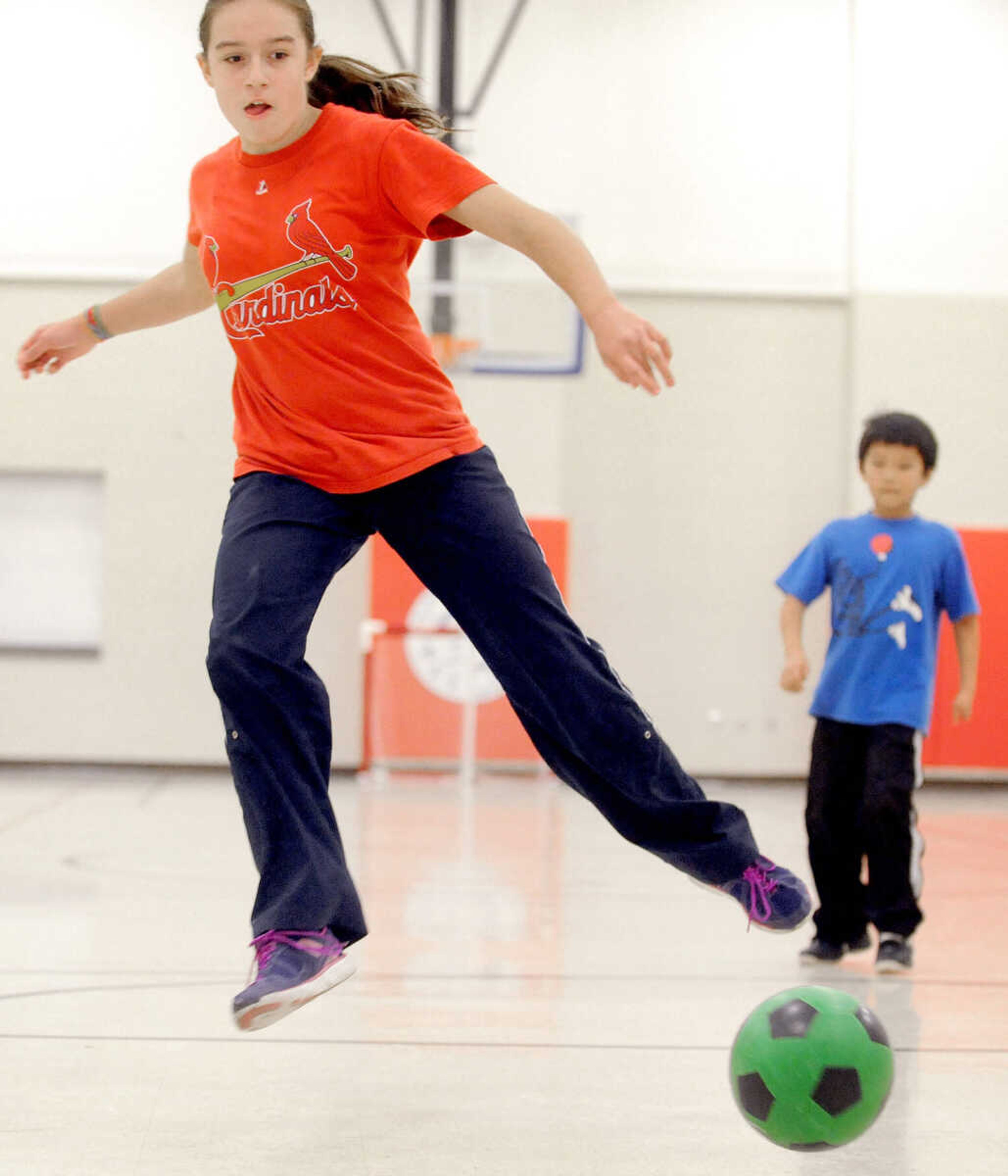 LAURA SIMON ~ lsimon@semissourian.com

Abbi Thomason dribbles the ball towards the goal, Friday, Nov. 1, 2013, during her homeschool physical education class at Shawnee Park Center in Cape Girardeau.