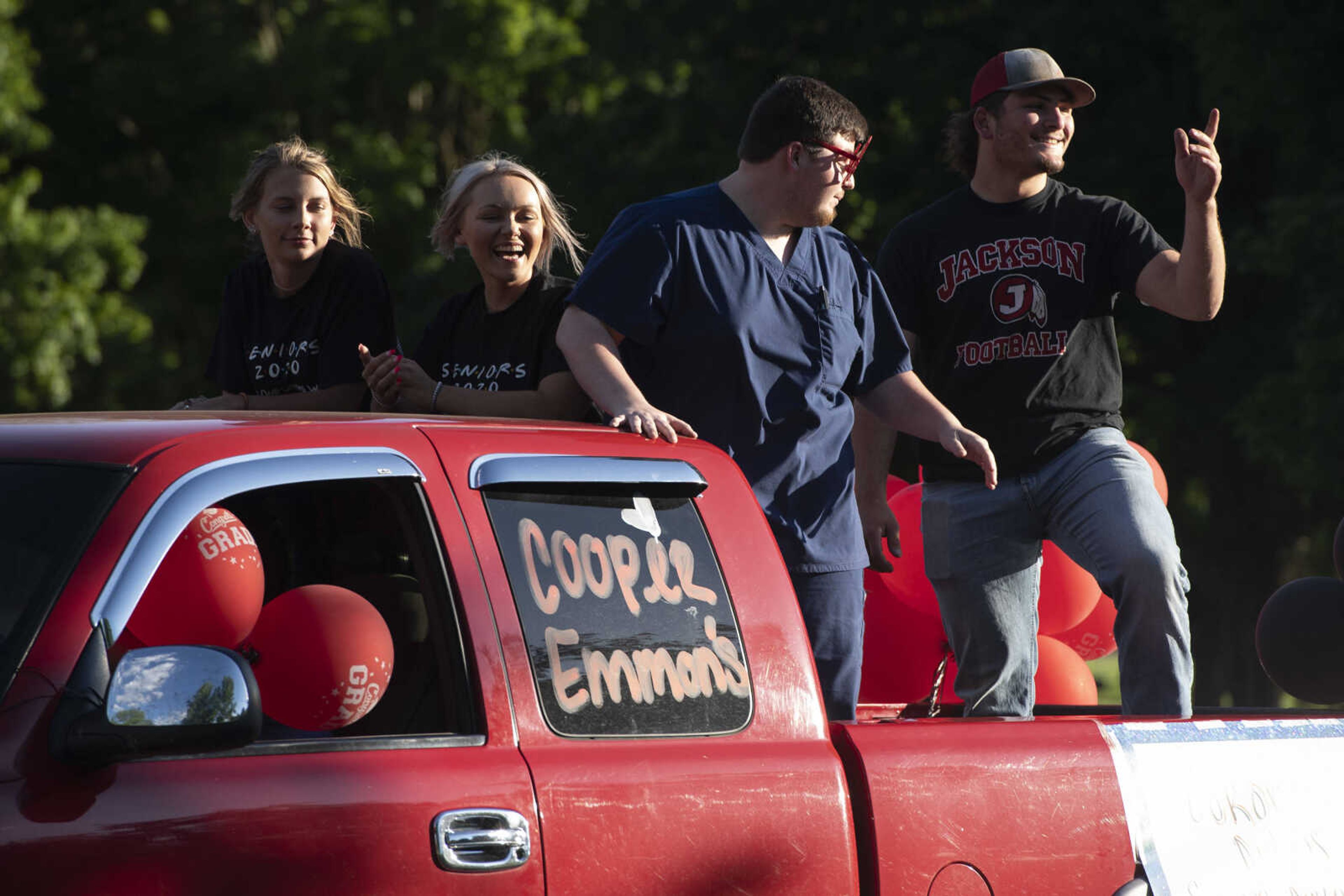 Parade participants take part in a procession for Jackson High School seniors Friday, May 29, 2020, at Jackson City Park.