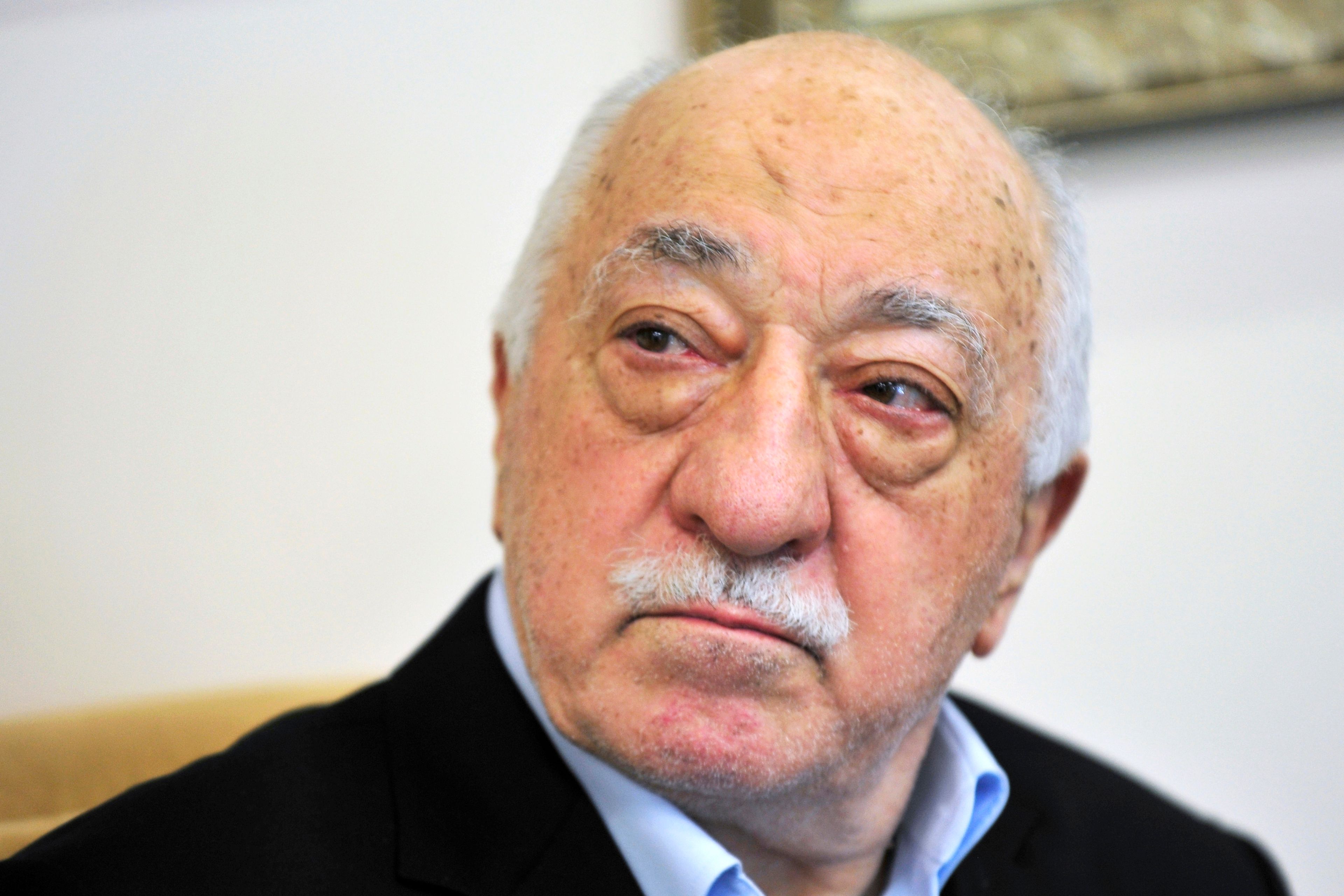 FILE - Turkish Islamic cleric Fethullah Gulen speaks to members of the media at his compound in Saylorsburg, Pa. in July 2016. (AP Photo/Chris Post, File)