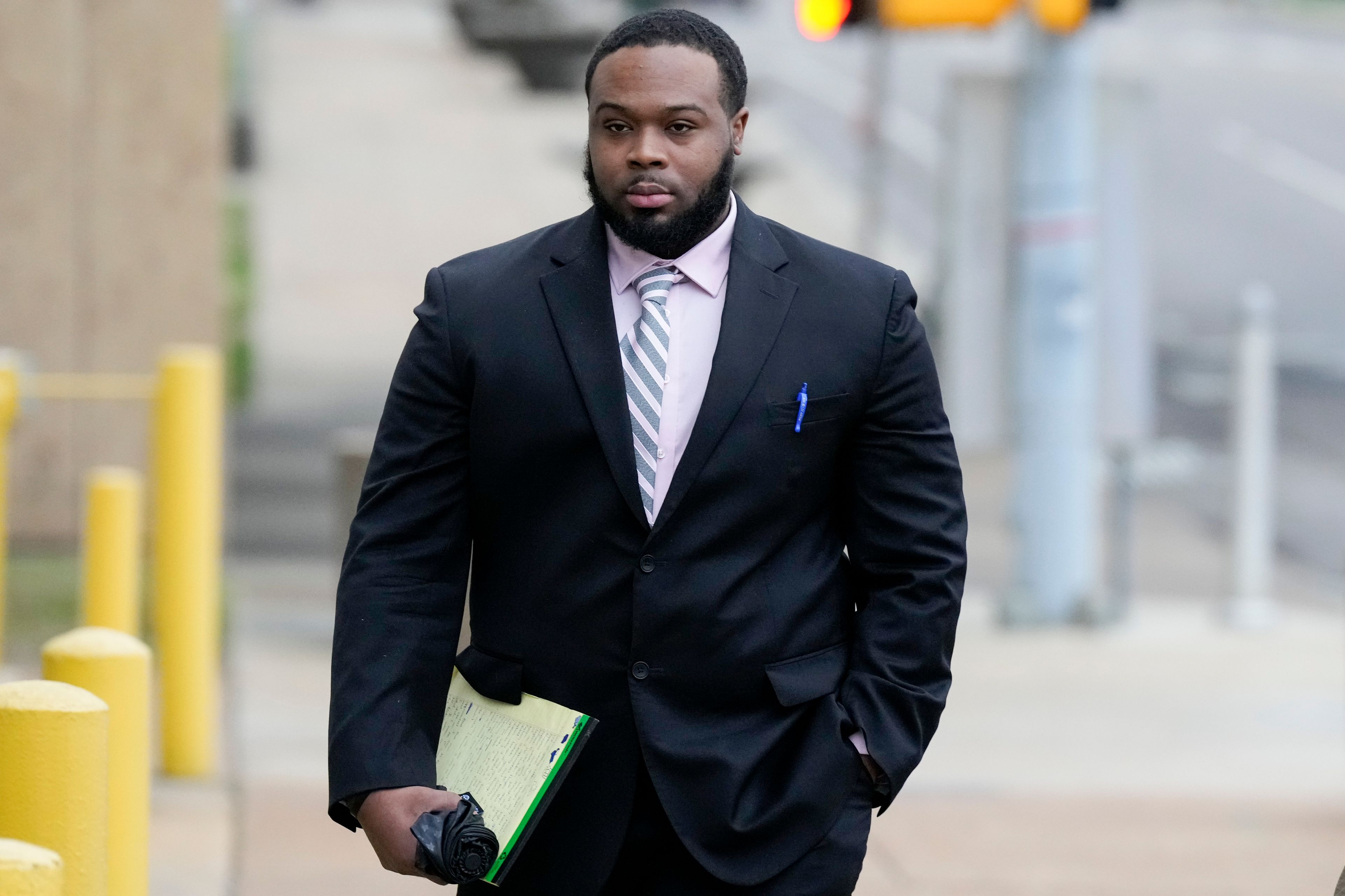 Former Memphis police officer Demetrius Haley arrives at the federal courthouse for the day's proceedings during the trial in the Tyre Nichols case Wednesday, Sept. 25, 2024, in Memphis, Tenn. (AP Photo/George Walker IV)