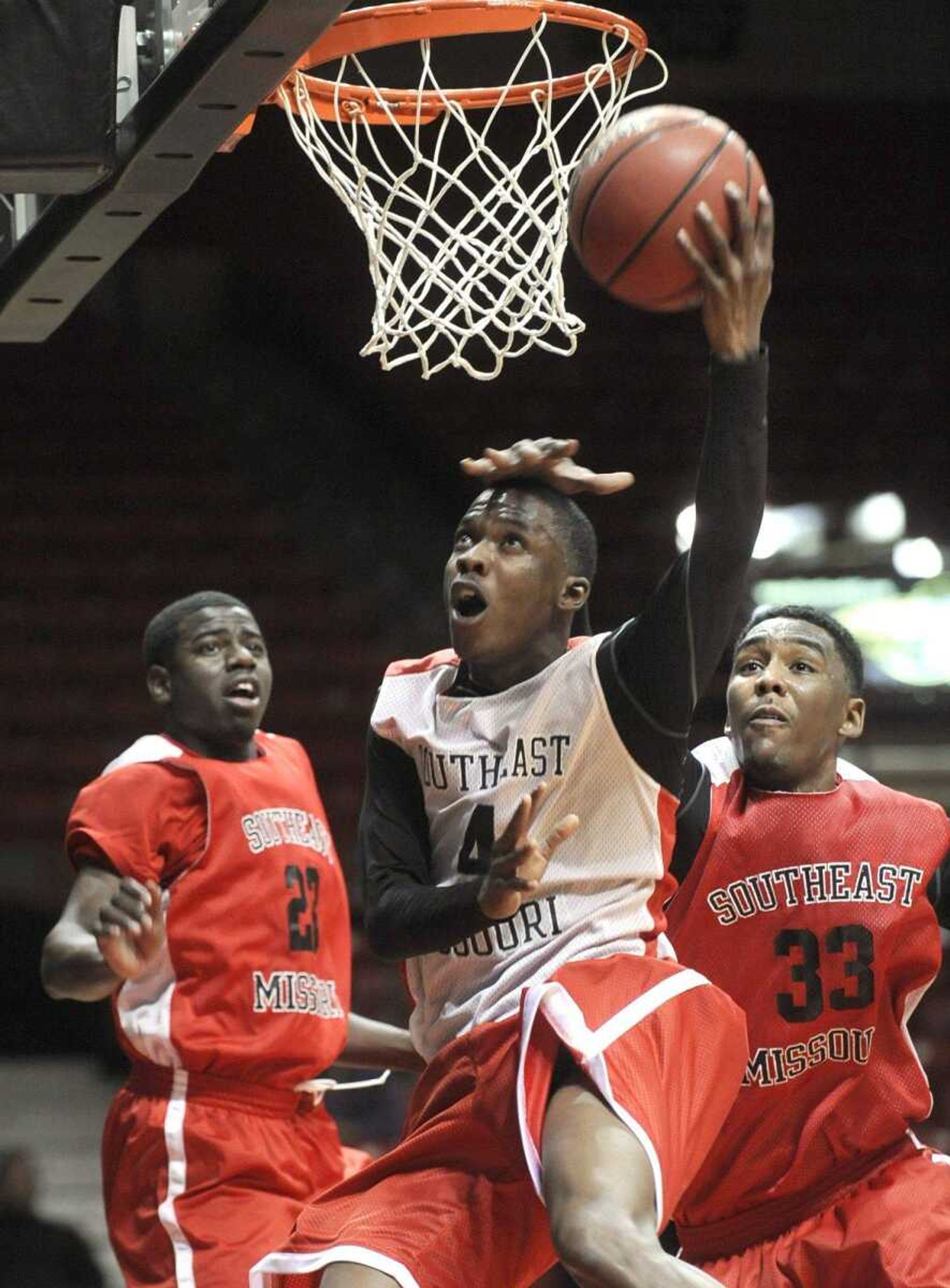 Corey Wilford goes up for a shot while Tyler Stone reaches from behind during the Southeast men&#8217;s basketball scrimmage Saturday at the Show Me Center. (Fred Lynch)