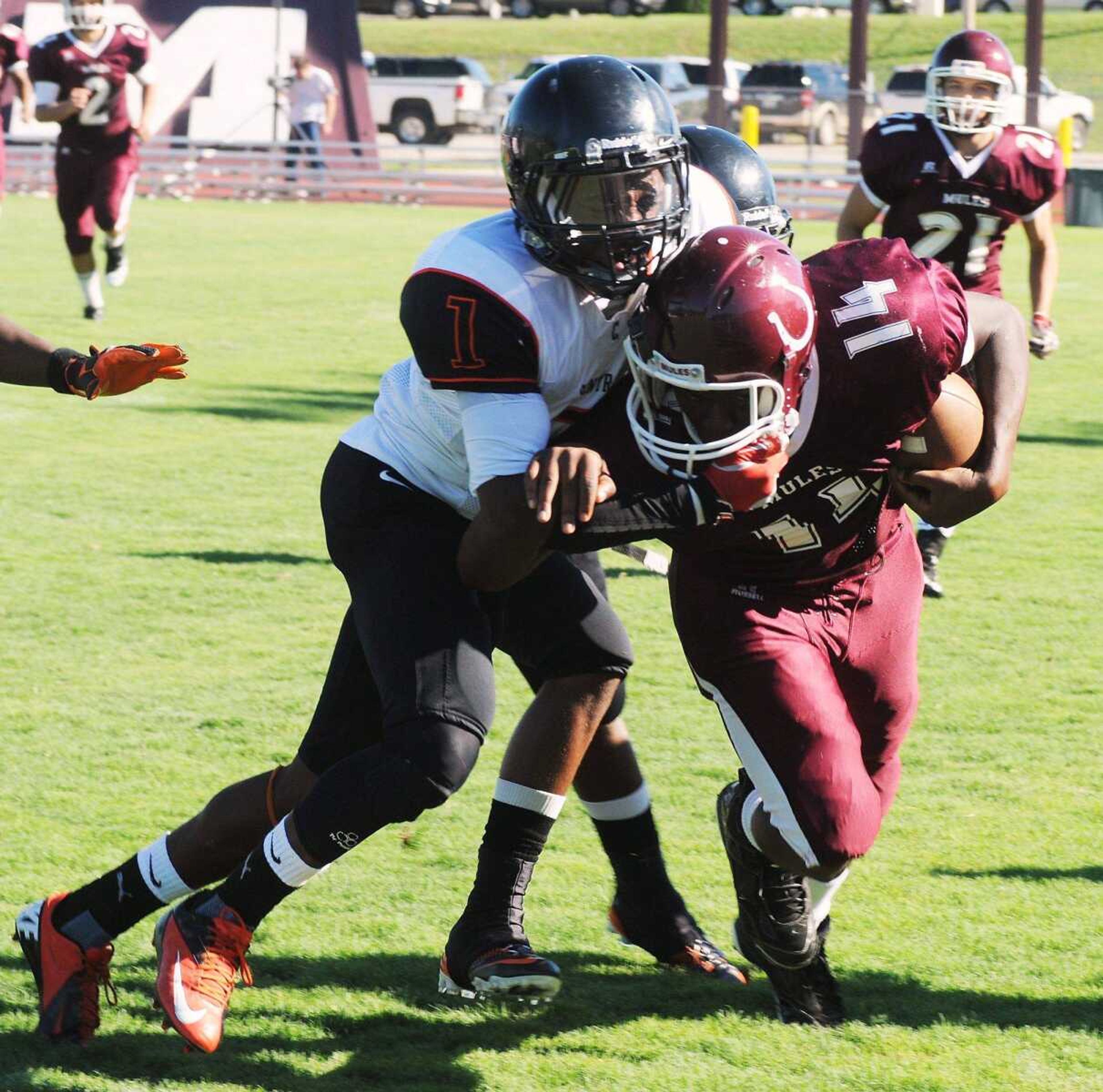 Central's Garan Evans makes a tackle of Poplar Bluff's Kimbrayl Miller during the first half Saturday afternoon in Poplar Bluff, Mo. (Daily American Republic/Alex Abate)