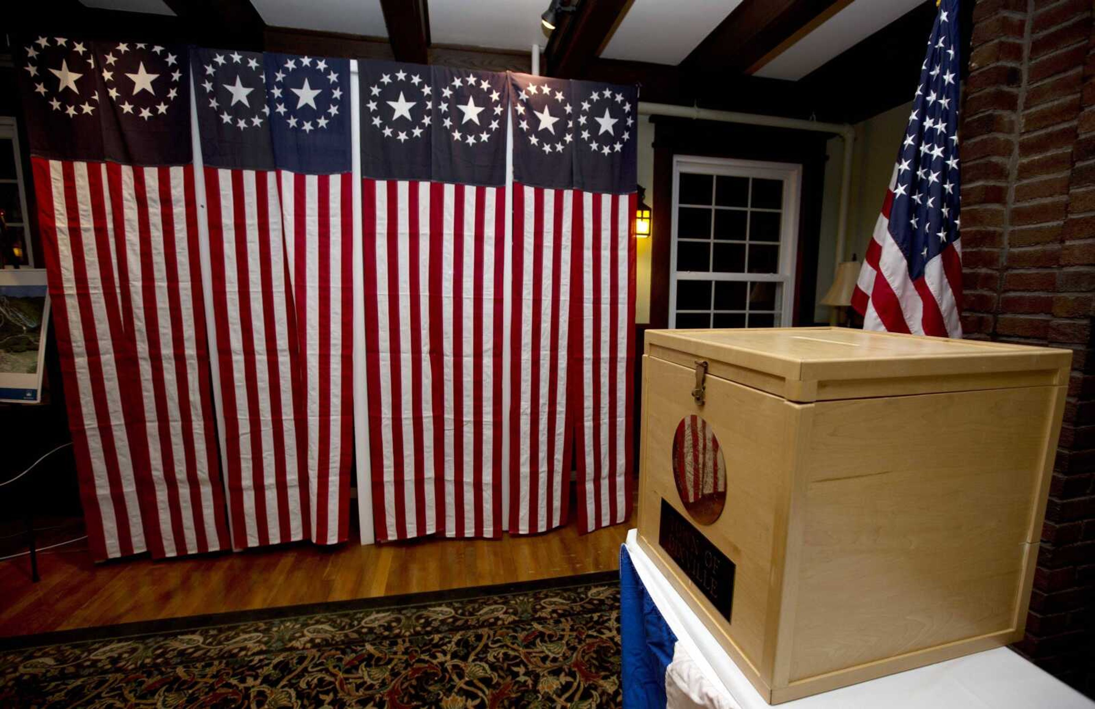 A ballot box is set for residents to vote at midnight Nov. 7 in Dixville Notch, New Hampshire. A request for detailed information about every voter in the U.S. from President Donald Trump's voting commission is getting a rocky reception in the states.