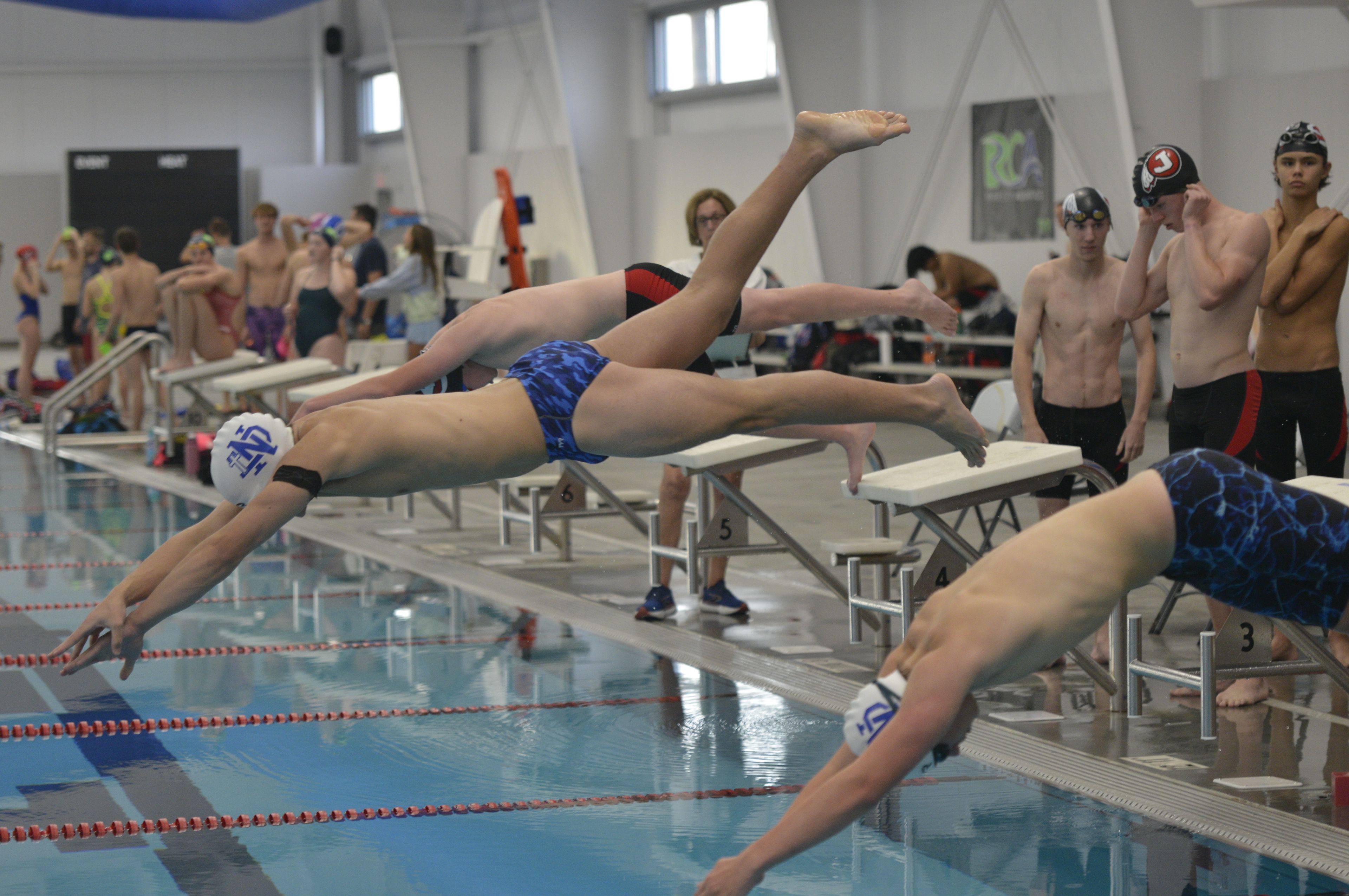 Notre Dame's Hudson Dennis dives to start a race against Jackson on Monday, Oct. 28, at the Cape Aquatic Center.