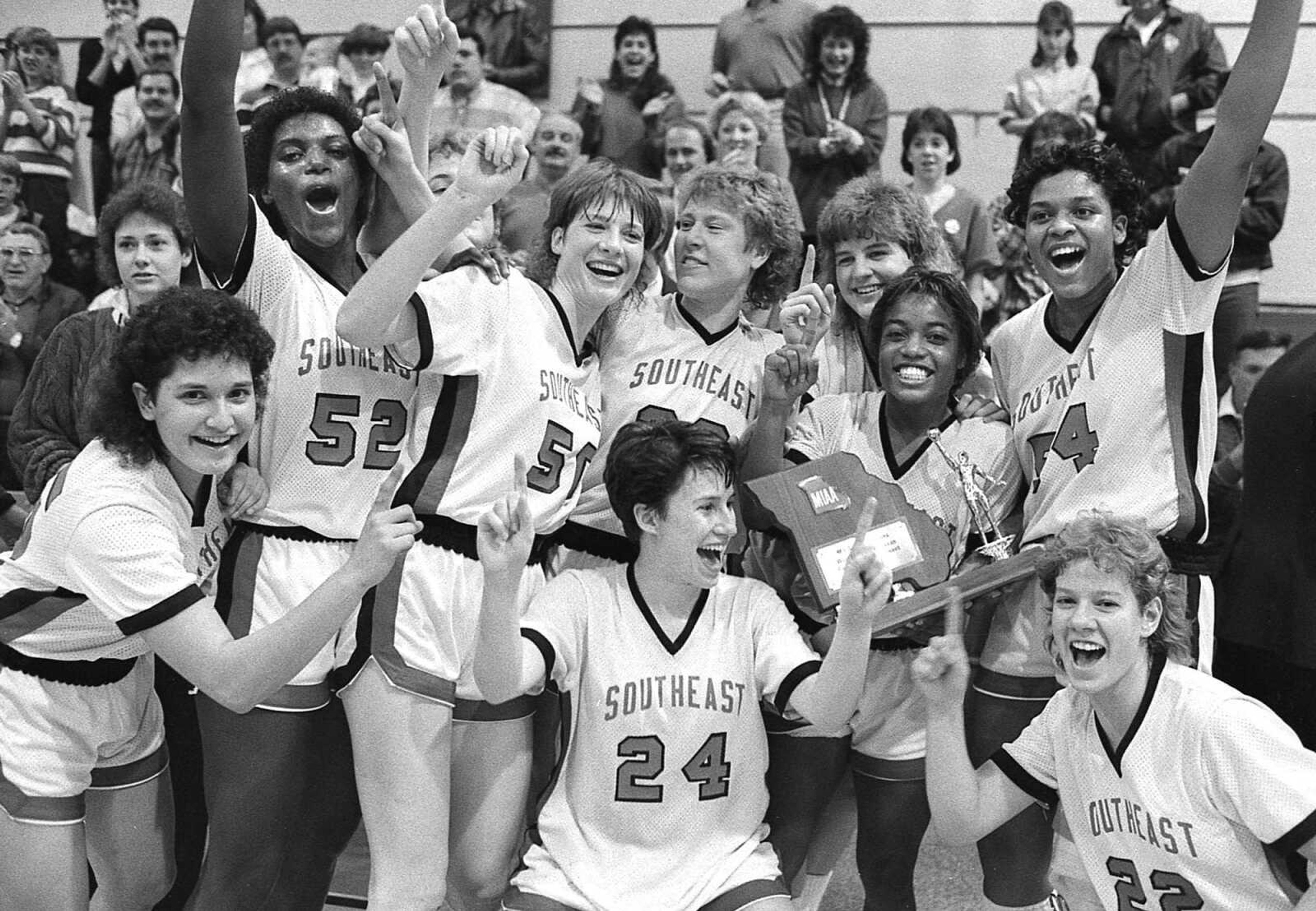 Published March 1, 1987.
The Southeast Missouri State University Otahkians celebrated their Missouri Intercollegiate Athletic Association post-season conference tournament title at Houck Field House in apt fashion. (Mark Sterkel ~ Southeast Missourian archive)