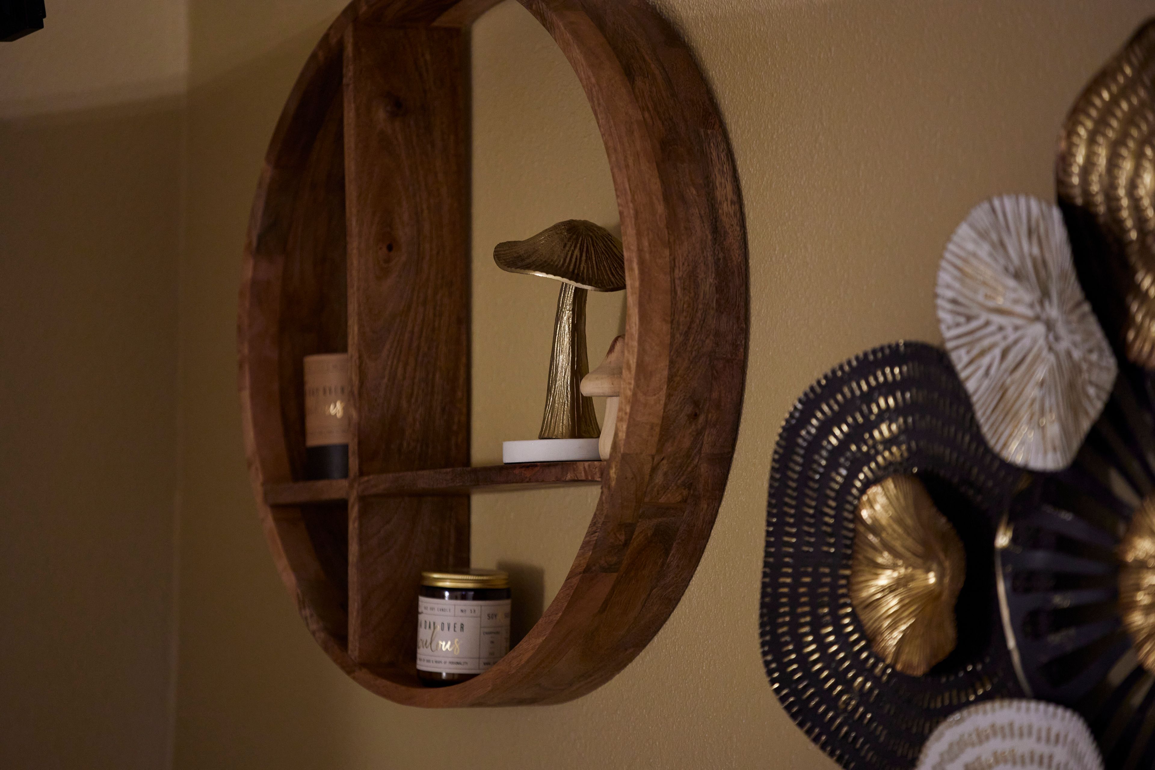 Mushroom decorations hang on the wall in a room for a patient journey at a Psilocybin facility in Gresham, Ore., Monday, Nov. 18, 2024. (AP Photo/Craig Mitchelldyer)