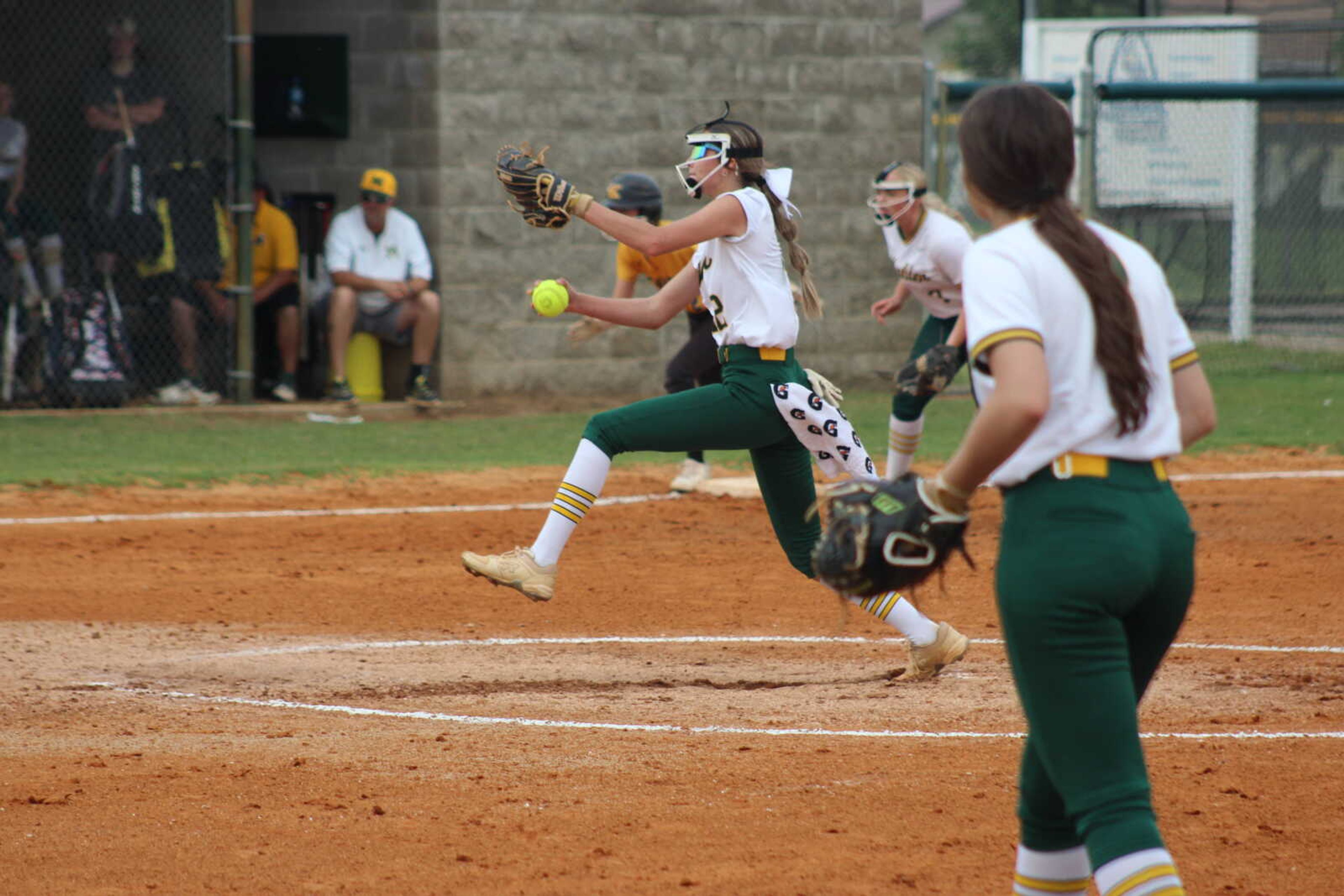 Malden Lady Green Wave pitcher Alyssa Broom winds up Monday at Malden.