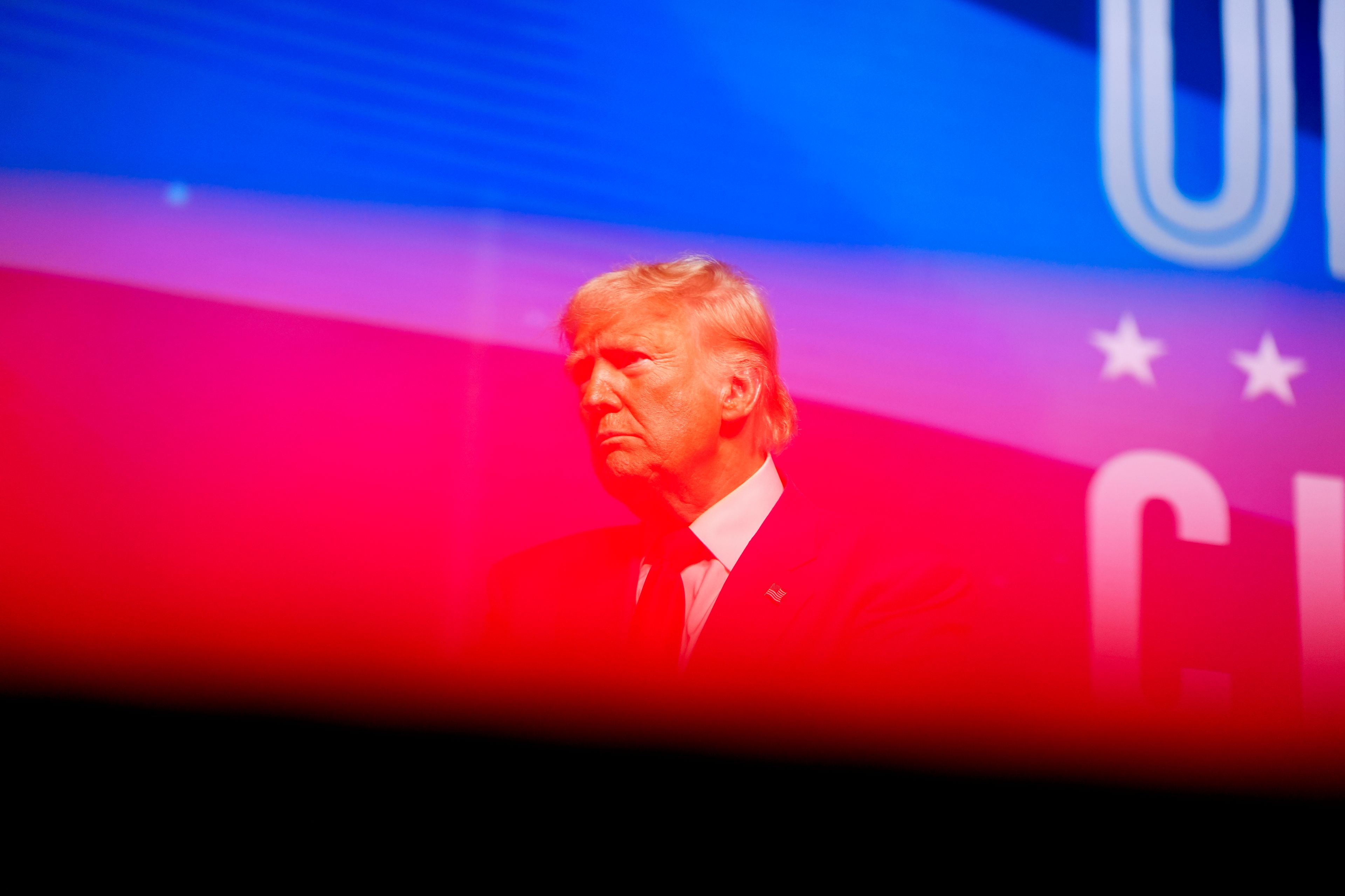 Republican presidential nominee former President Donald Trump stands on stage after speaking during a campaign rally at Thomas & Mack Center, Thursday, Oct. 24, 2024, in Las Vegas. (AP Photo/Alex Brandon)