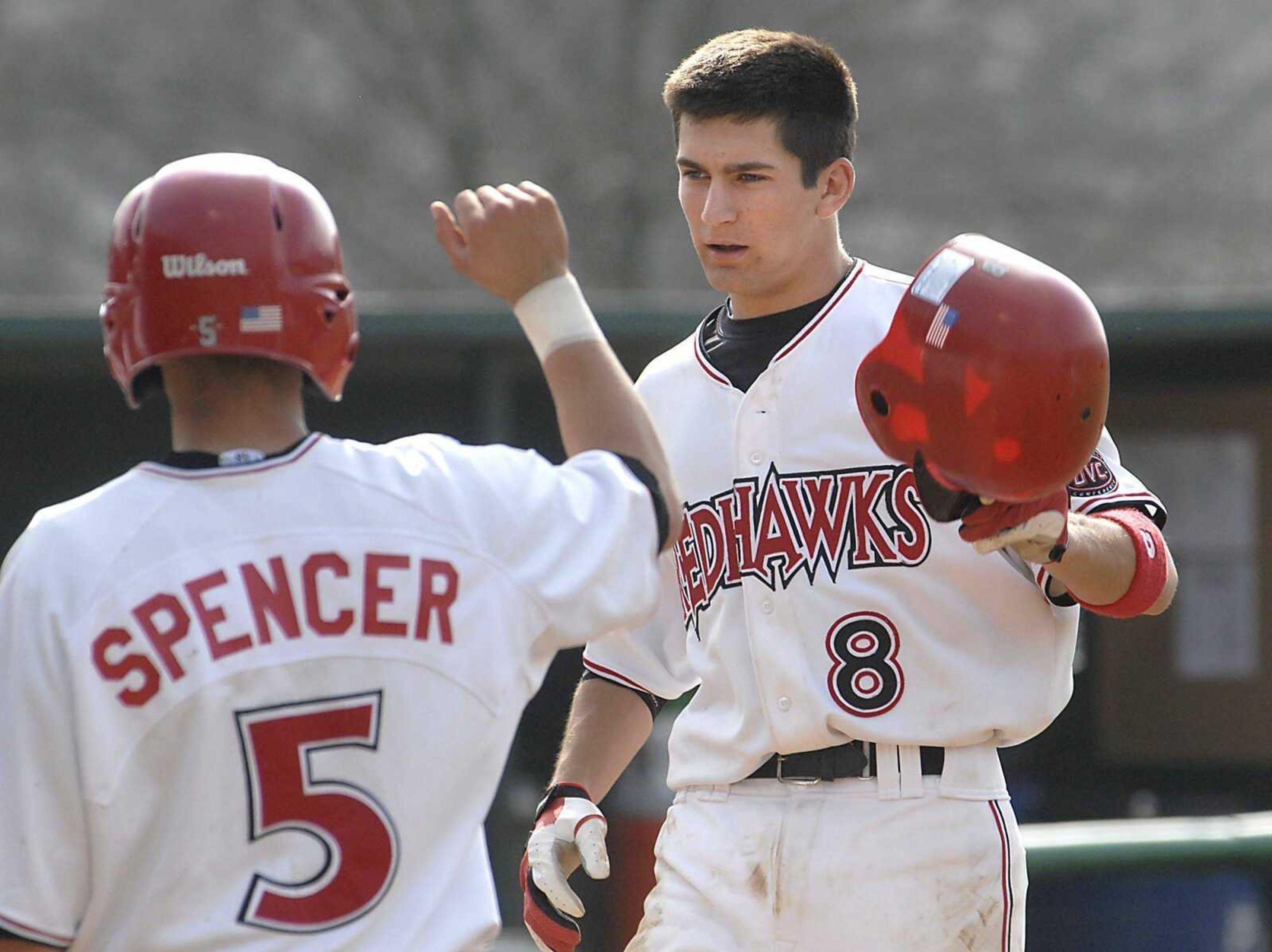 Southeast Missouri State's Nick Harris crosses the plate after hitting a three-run homer against Southern Illinois at Capaha Field in 2008. (Fred Lynch)