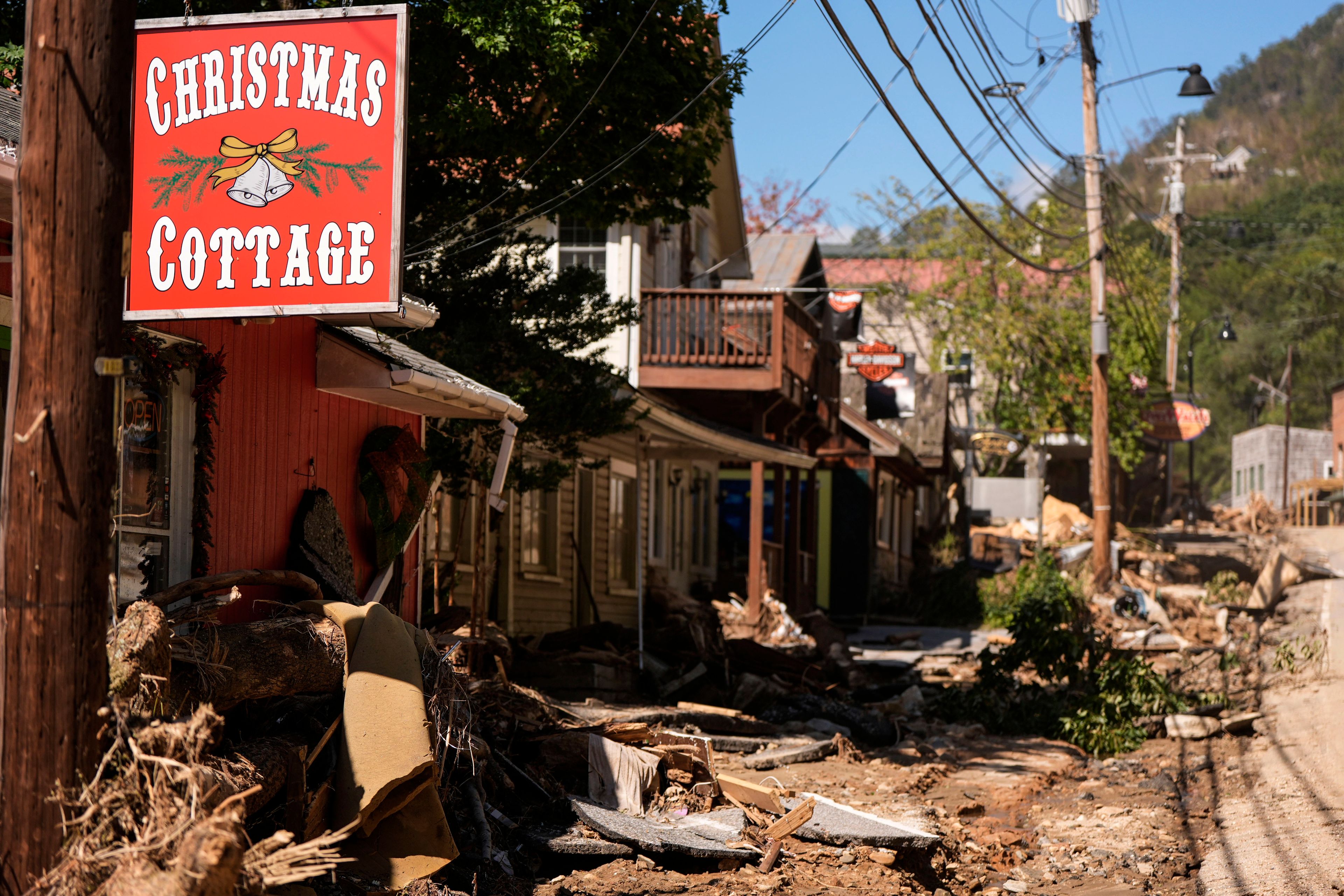 Business are seen in a debris field in the aftermath of Hurricane Helene, Wednesday, Oct. 2, 2024, in Chimney Rock Village, N.C. (AP Photo/Mike Stewart)