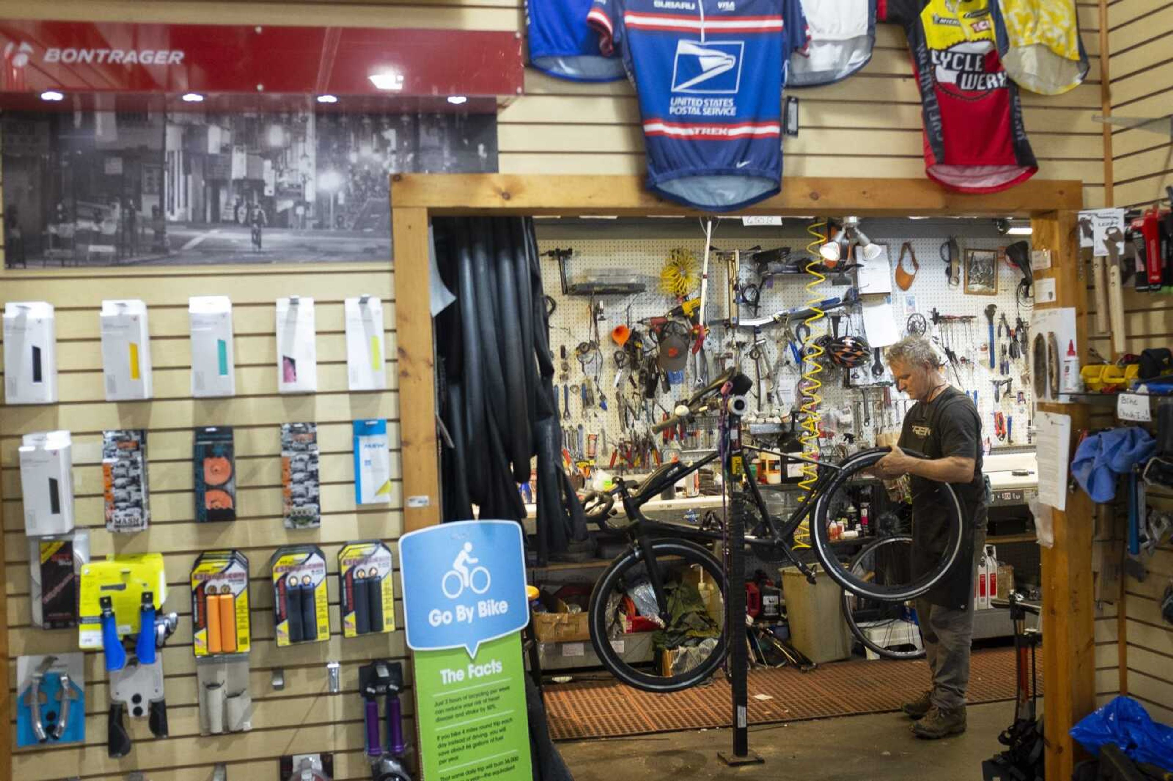 CYCLEWERX owner John Dodd of Cape Girardeau works on a bike Thursday at the shop, 1407 N. Kingshighway in Cape Girardeau.