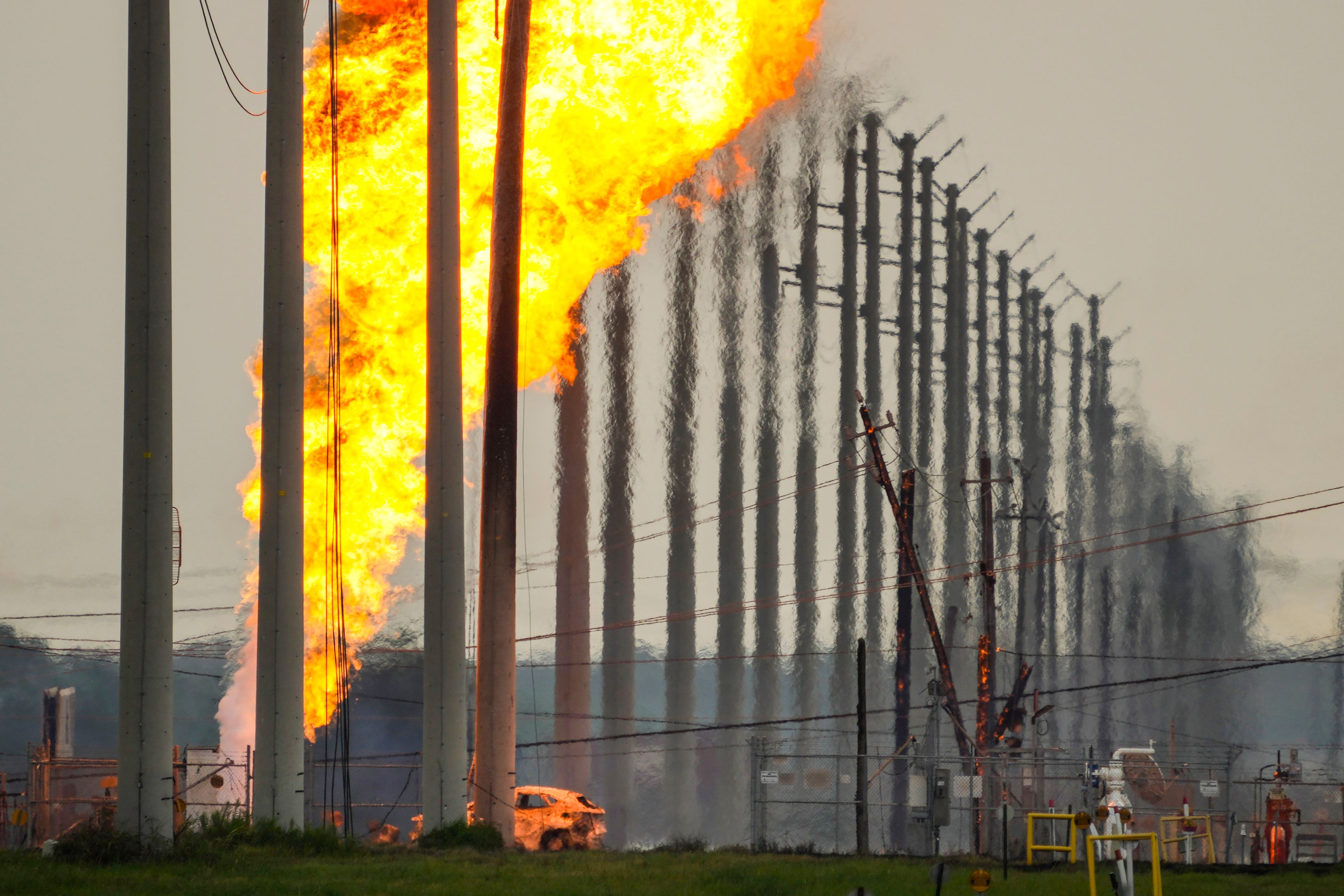 A pipeline carrying liquified natural gas burns near Spencer Highway and Summerton on Monday, Sept. 16, 2024, in La Porte, Texas. (Brett Coomer/Houston Chronicle via AP)