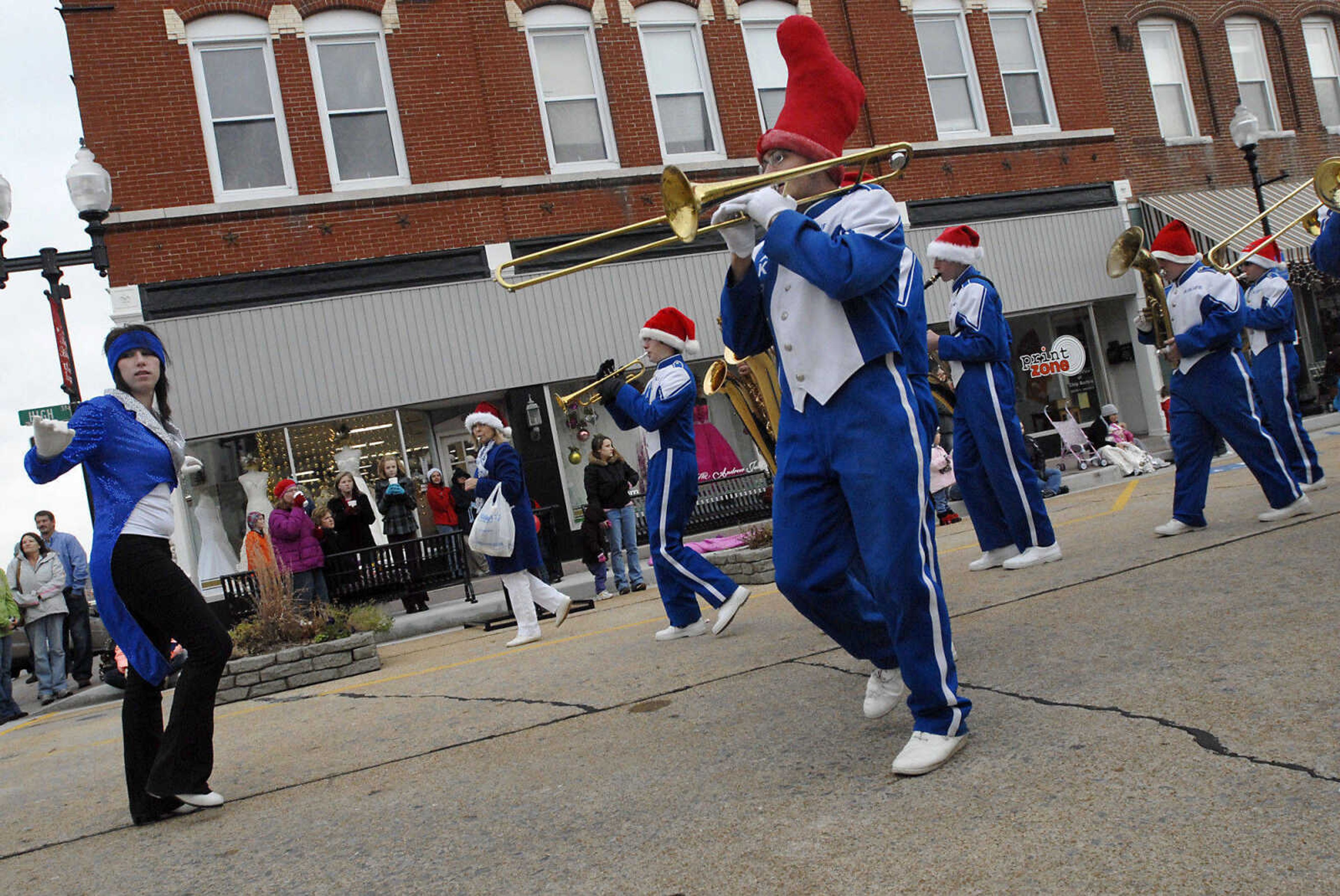 KRISTIN EBERTS ~ keberts@semissourian.com

The Oak Ridge marching band plays during the Jackson Christmas Parade on Saturday, Dec. 4, 2010, in downtown Jackson.