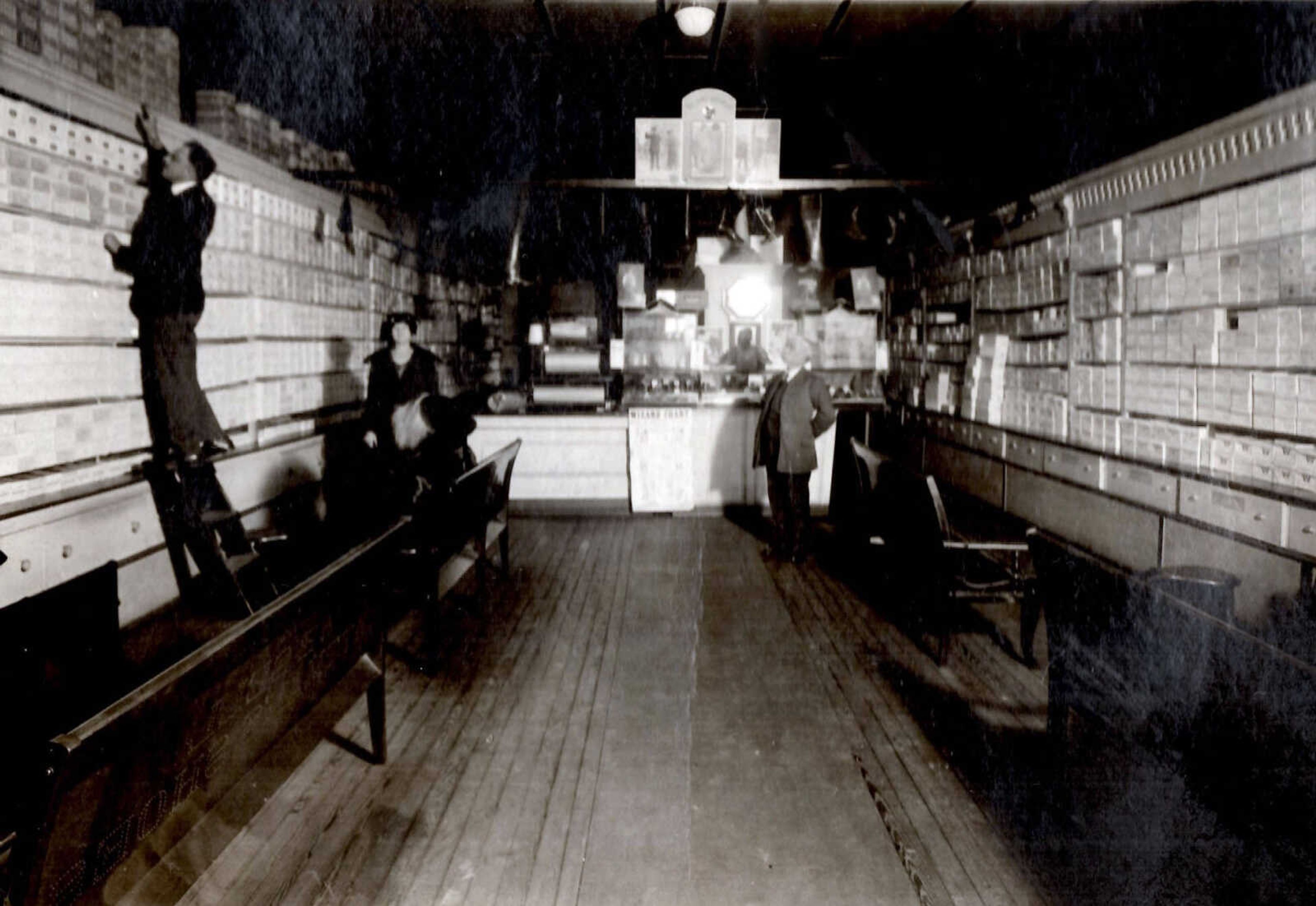 This undated interior photo of August Lang Shoe Store at 19 N. Main St. in Cape Girardeau is part of the Lang Photo Collection at the Cape Girardeau County Archive Center in Jackson. A crowdsourcing identification project, ID Friday, is underway on the Archive’s Facebook page.
