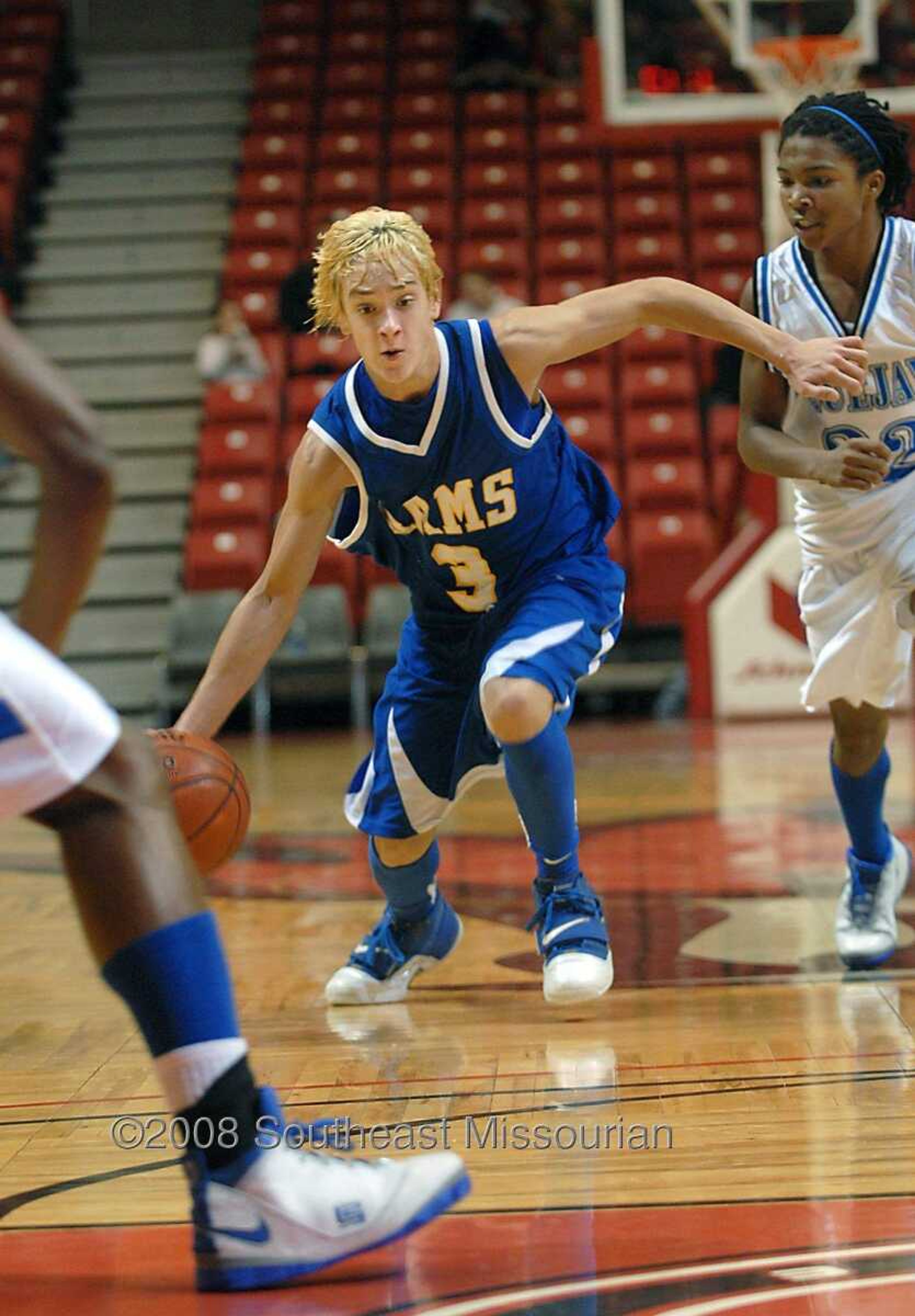 KIT DOYLE ~ kdoyle@semissourian.com
Scott City junior Skylar Cobb dribbles up the court Friday, December 26, 2008, in the first round of the Southeast Missourian Christmas Tournament at the Show Me Center.